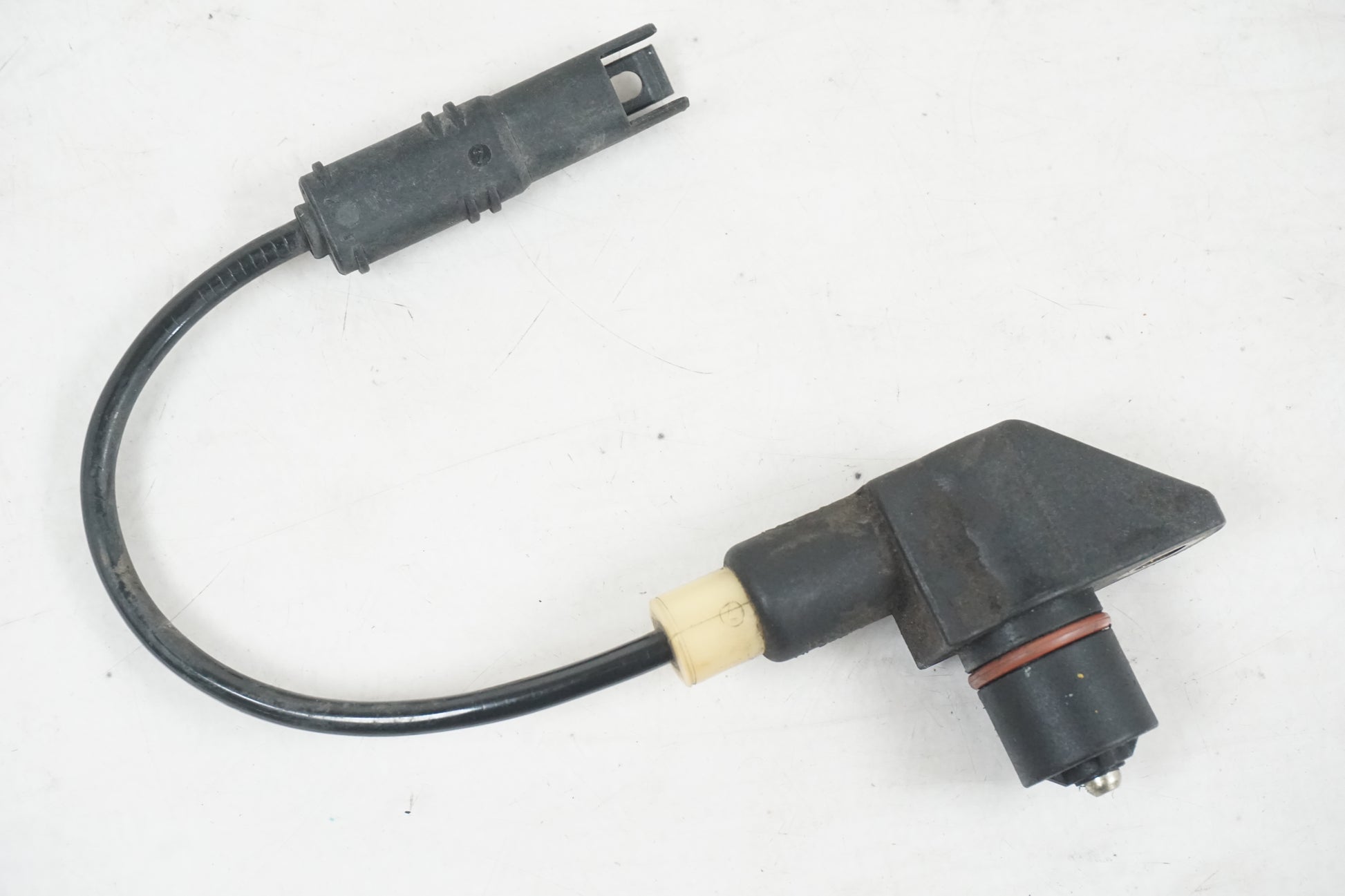 Framsidan på Vevaxelsensor från en BMW R 1200 GS -2004 motorcykel.