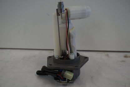 Framsidan på Bensinpump insprut från en Kawasaki Versys 650 -2007 motorcykel.