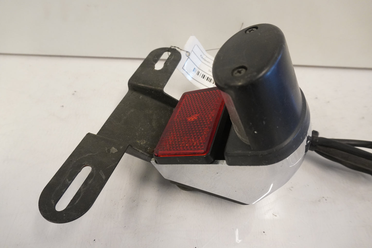 Baksidan på Skyltbelysning från en Kawasaki VN 800 -1998 motorcykel.