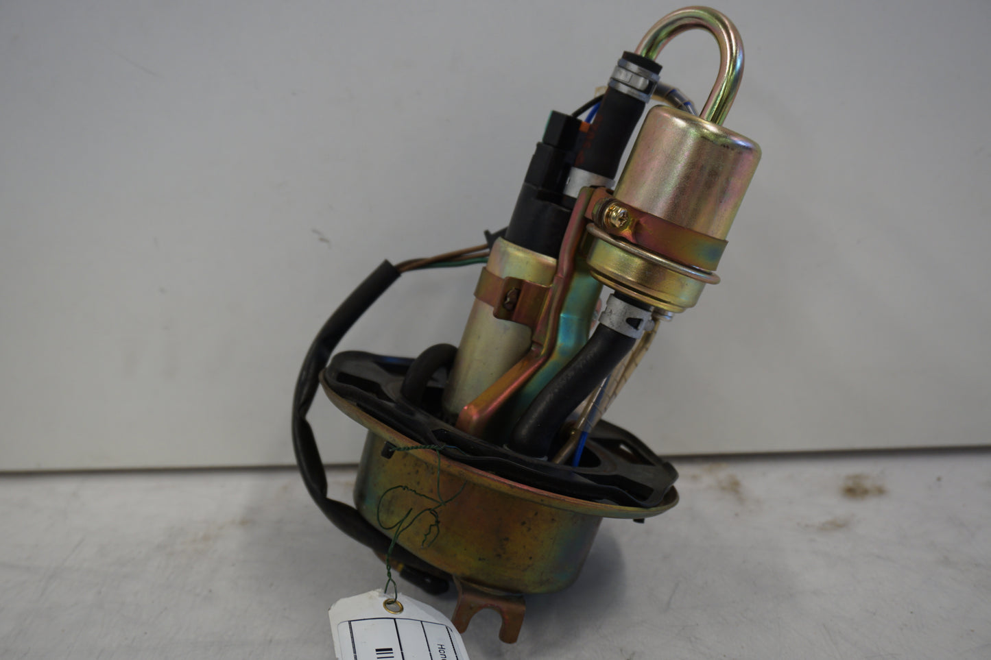 Framsidan på Bensinpump insprut från en Honda CBR 900 RR -2000 motorcykel.