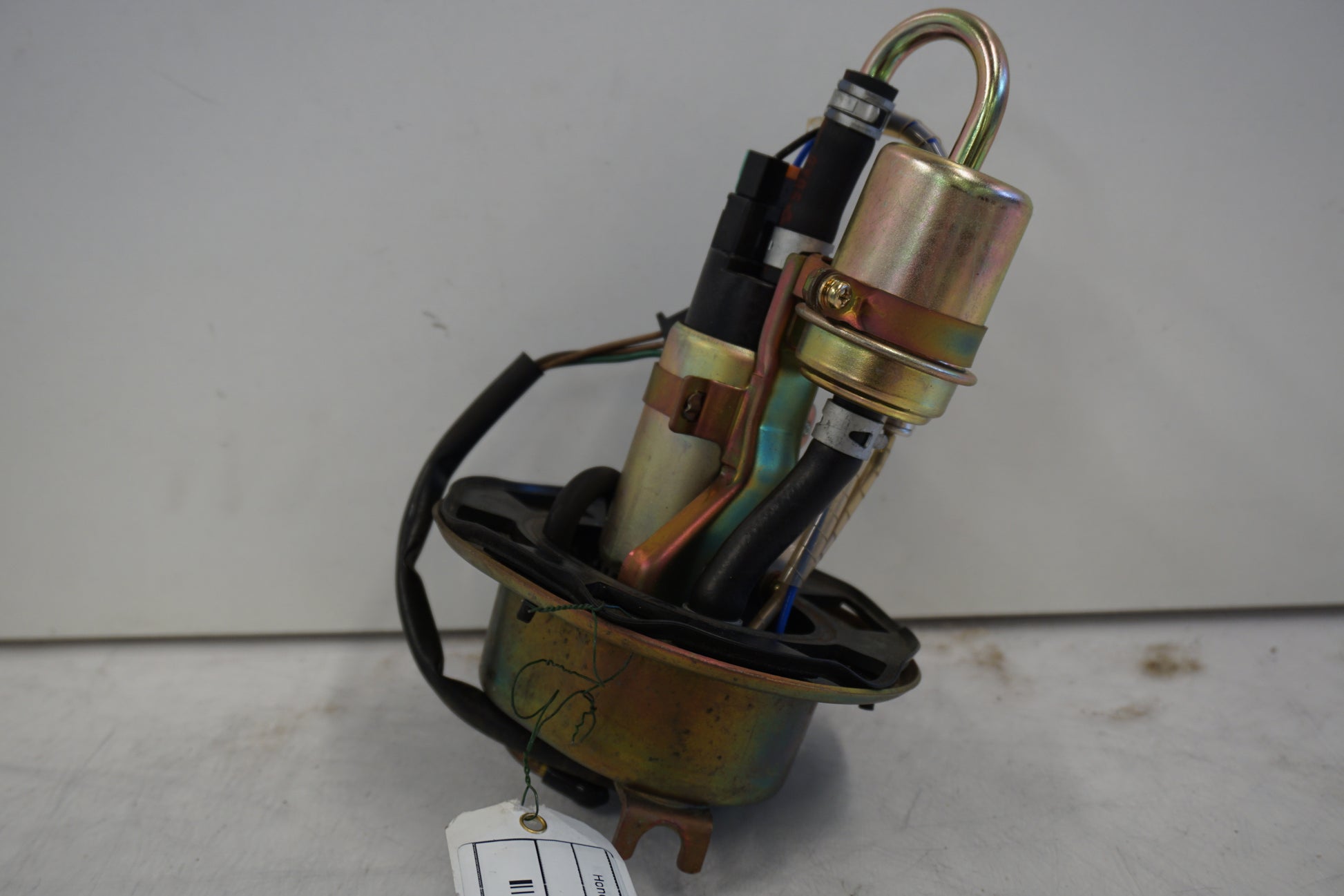 Framsidan på Bensinpump insprut från en Honda CBR 900 RR -2000 motorcykel.