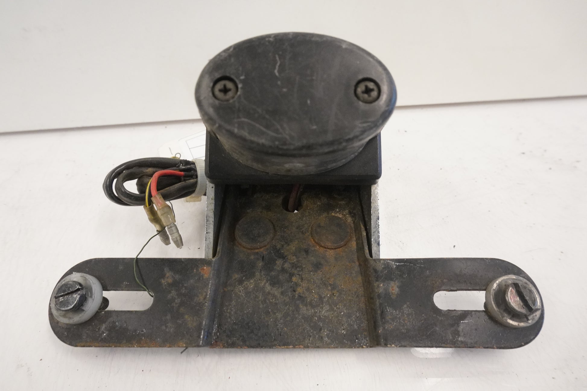 Baksidan på Skyltbelysning från en Kawasaki VN 750 -1993 motorcykel.