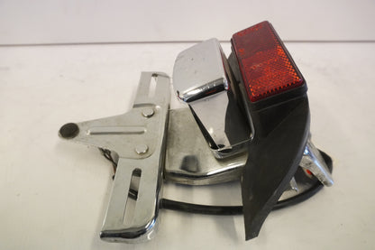 Vänster sida på Skyltbelysning från en Suzuki VS 1400 -1997 motorcykel.