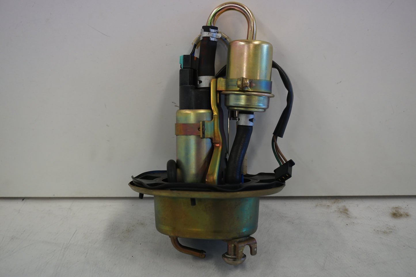 Framsidan på Bensinpump insprut från en Honda CBR 900 RR -2000 motorcykel.