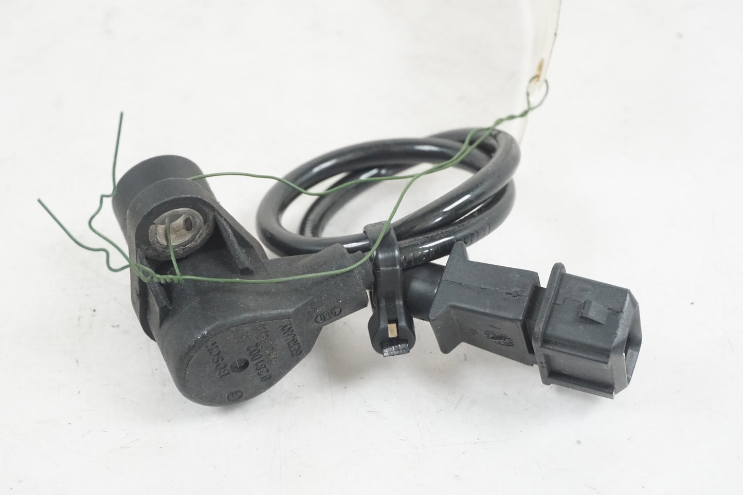 Framsidan på Tändpickup från en Ducati Monster 696 -2008 motorcykel.