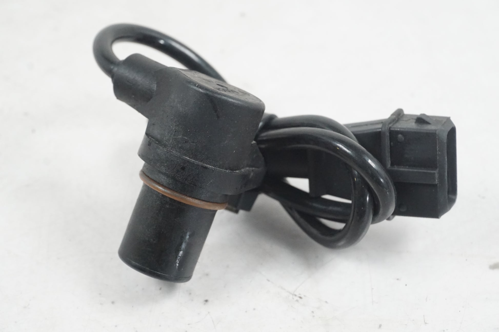 Framsidan på Tändpickup från en Aprilia Tuono V4R -2018 motorcykel.