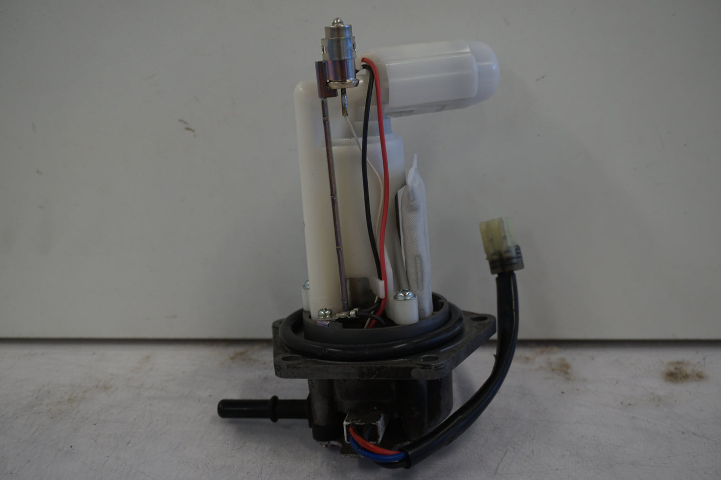 Framsidan på Bensinpump insprut från en Kawasaki ER-6N -2011 motorcykel.