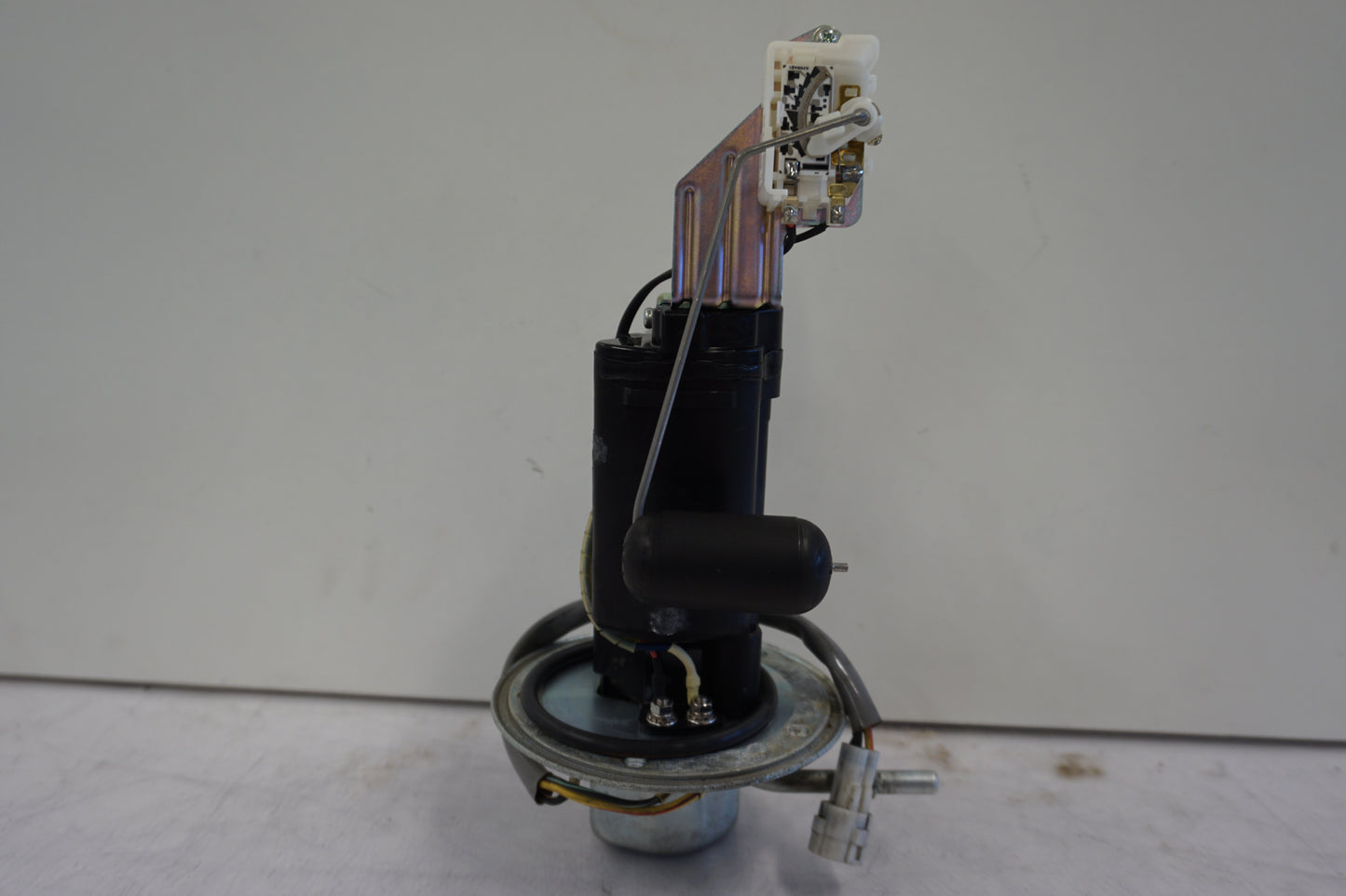 Höger sida på Bensinpump insprut från en Suzuki DL 1000 -2006 motorcykel.