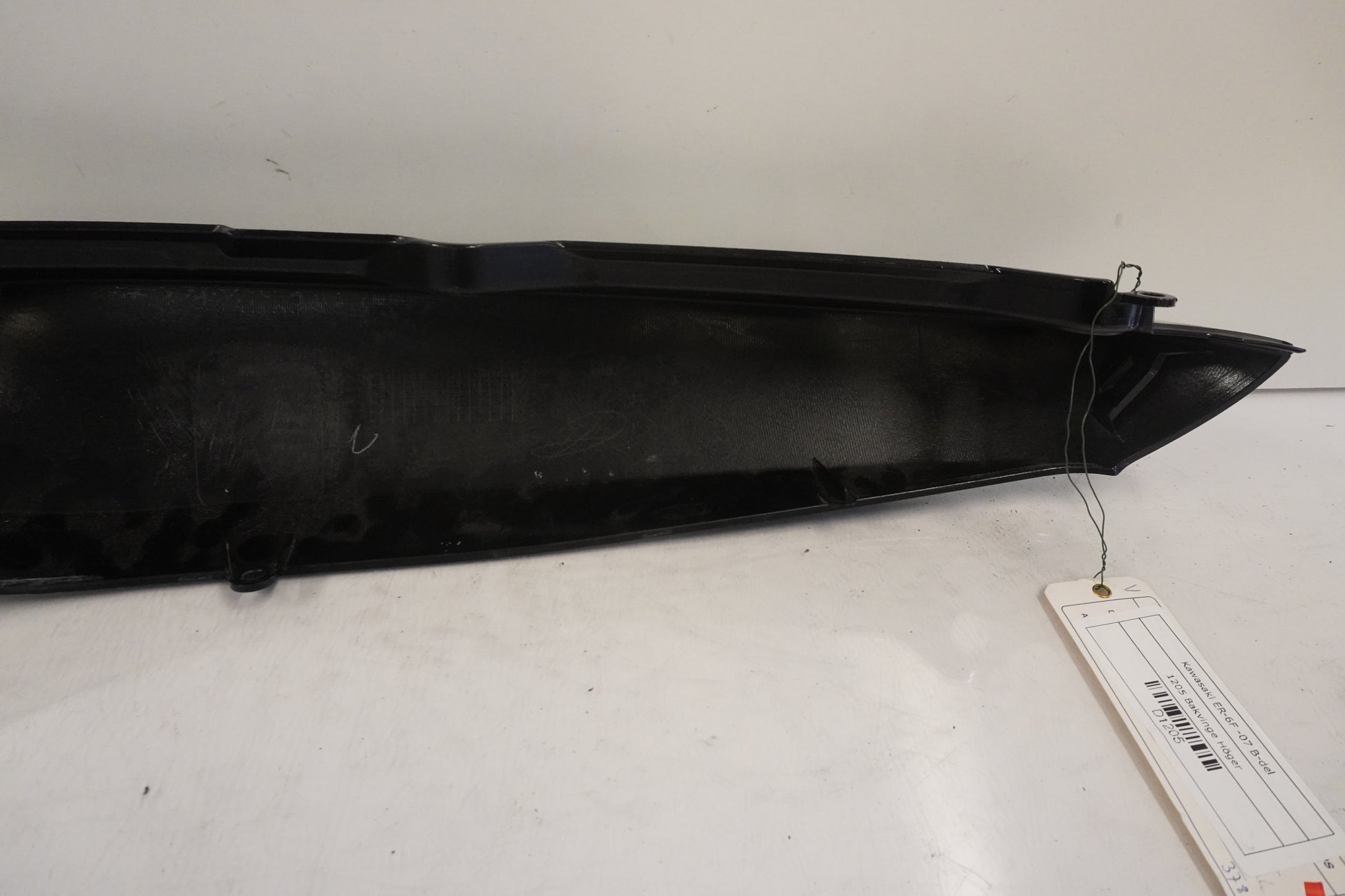 Höger sida på Bakvinge från en Kawasaki ER-6F -2007 motorcykel.