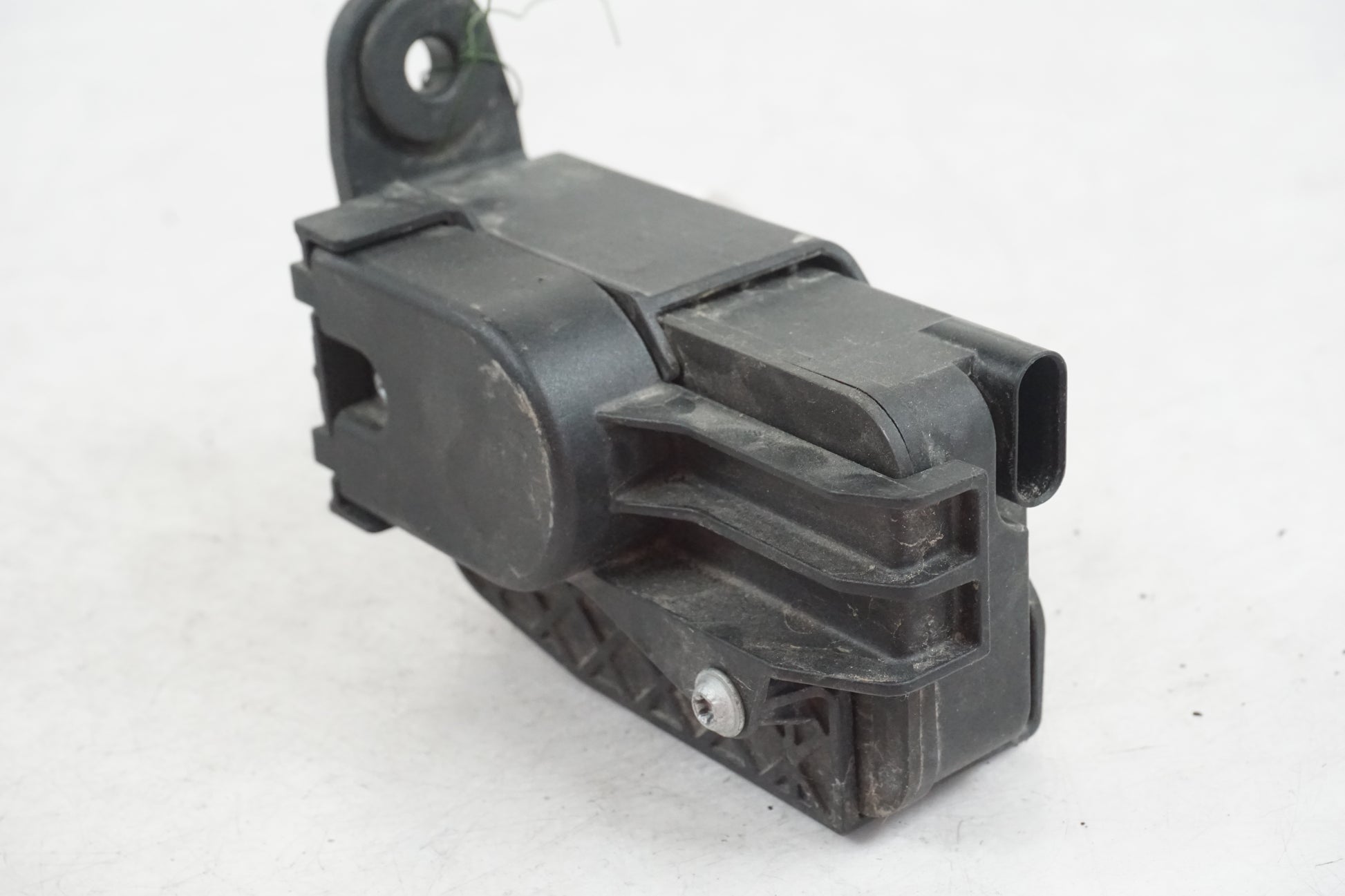 Baksidan på Avgasspjällmotor från en BMW R 1200 RT -2011 motorcykel.