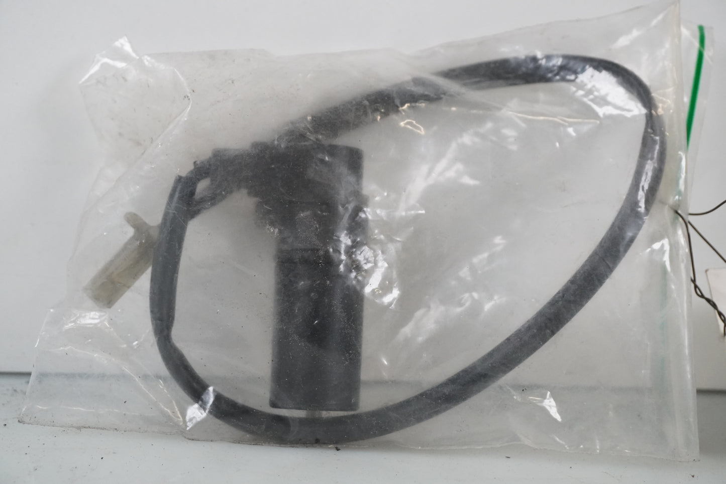 Framsidan på Kamaxelgivare från en Honda CBR 900 RR -2000 motorcykel.