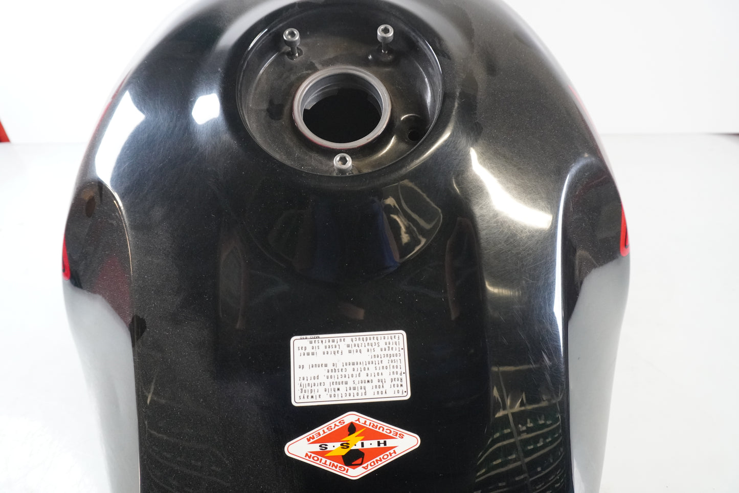 Höger sida på Bensintank från en Honda CBR 900 RR -2000 motorcykel.