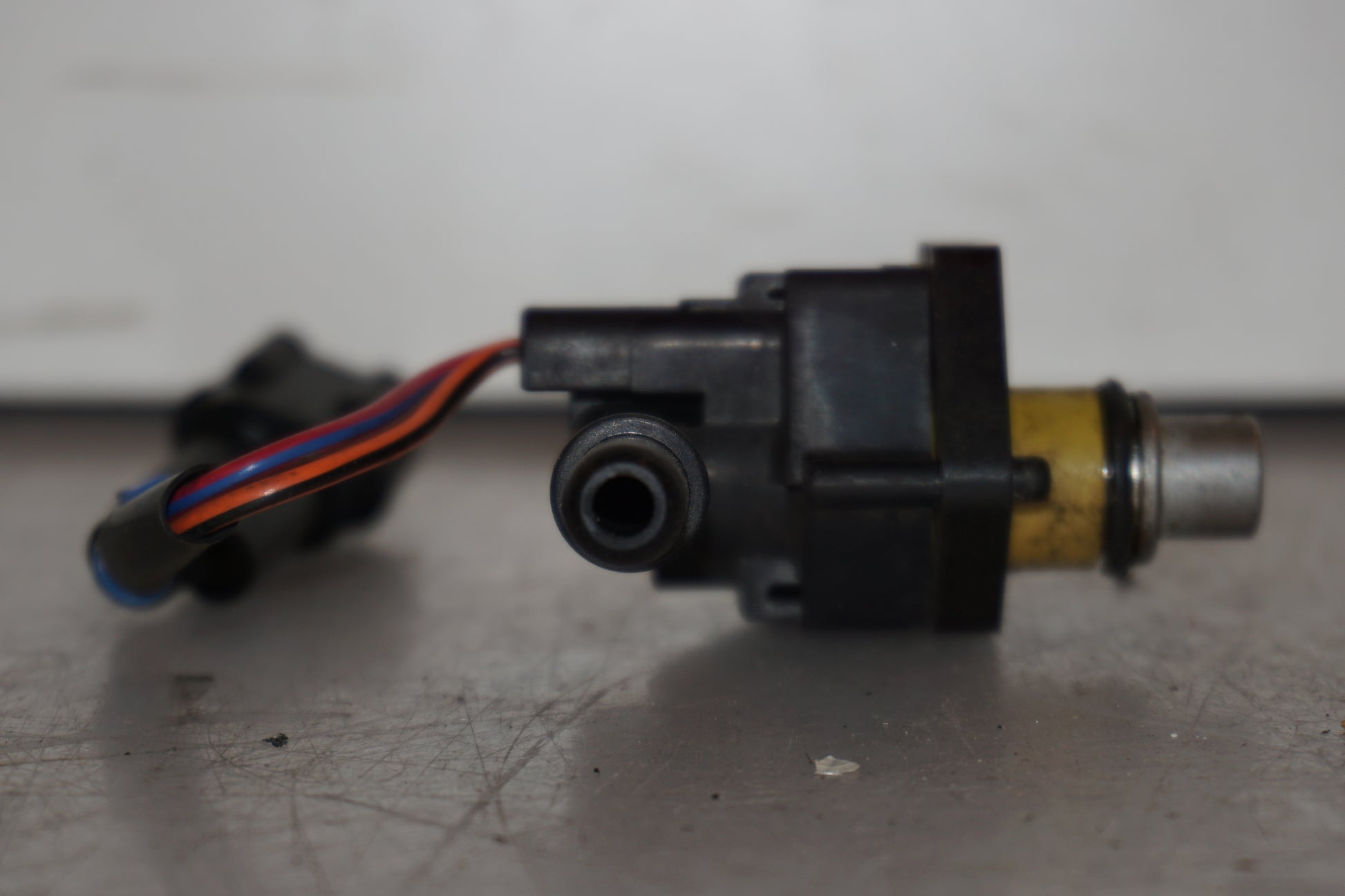 Höger sida på Spridare från en Yamaha YZF-R 125 -2008 motorcykel.