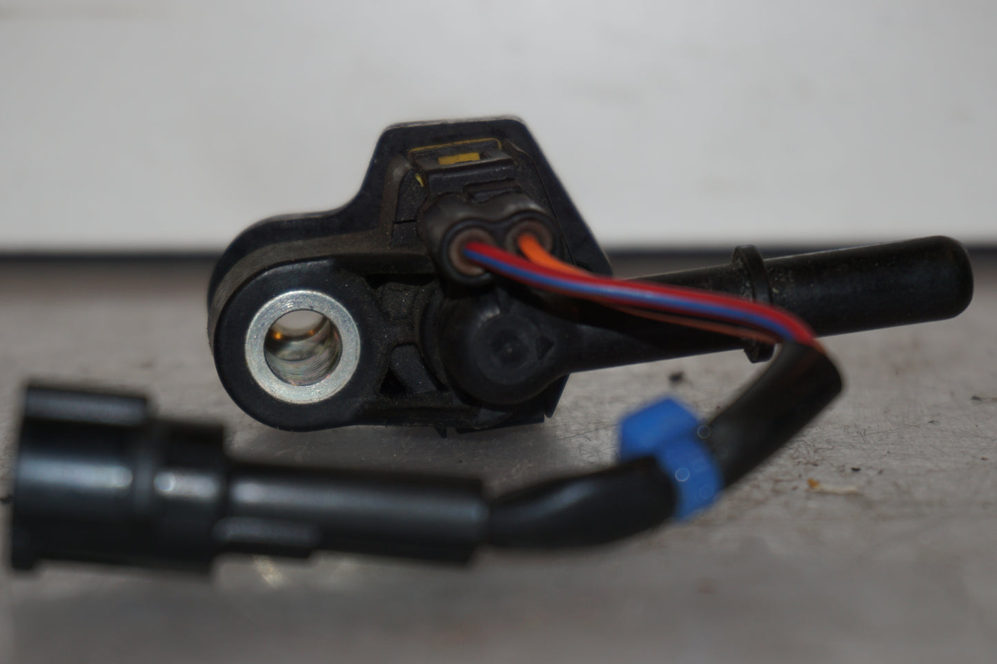 Vänster sida på Spridare från en Yamaha YZF-R 125 -2008 motorcykel.