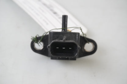 Baksidan på Luftsensor från en Suzuki TL 1000 S -1998 motorcykel.