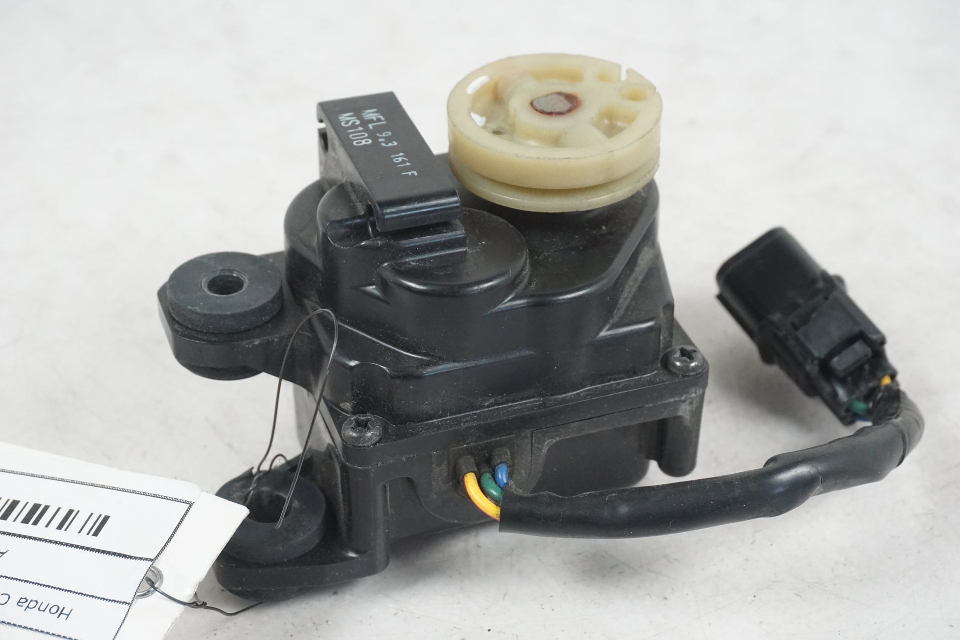 Baksidan på Avgasspjällmotor från en Honda CBR 1000 RR -2009 motorcykel.