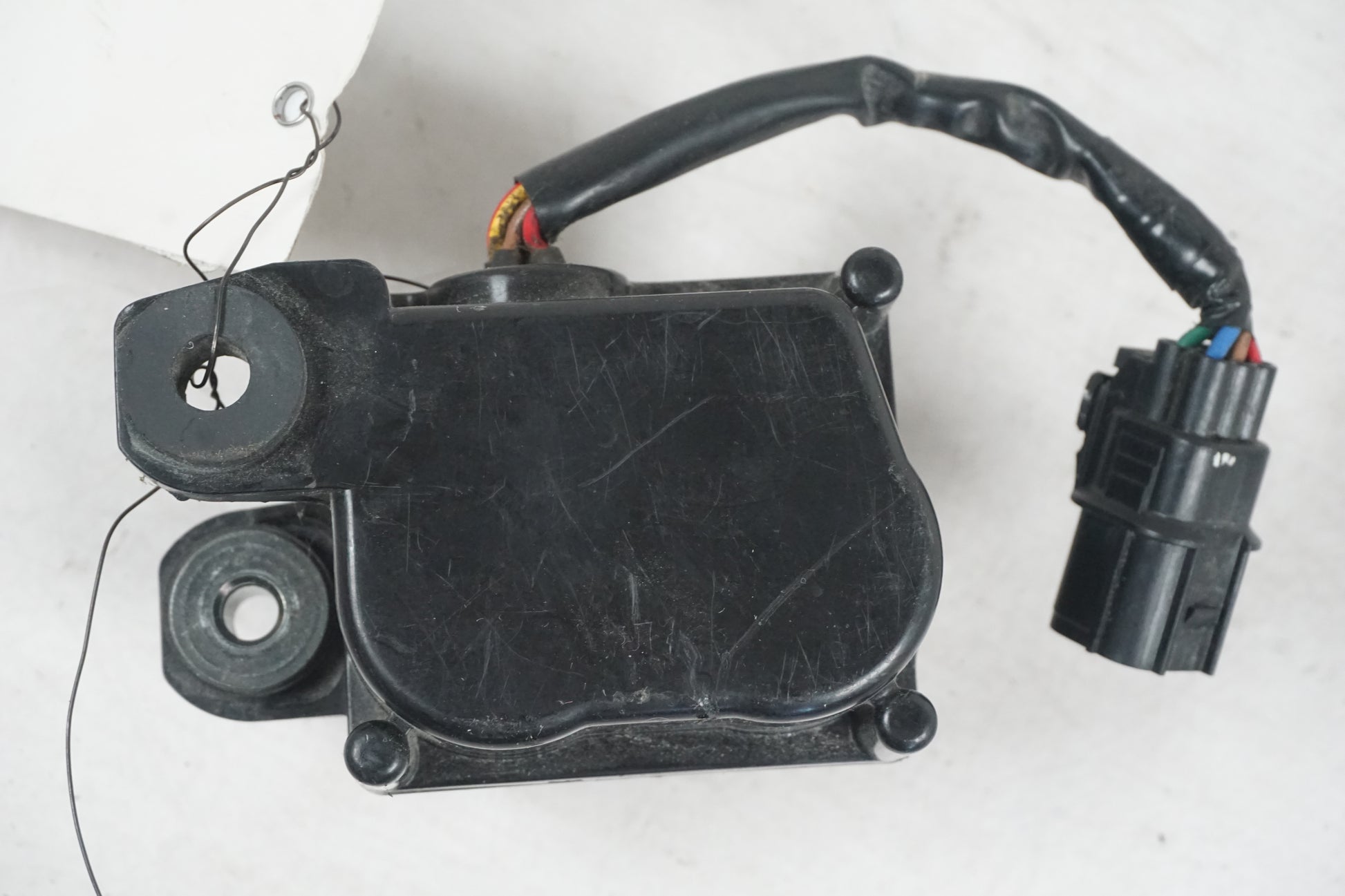 Vänster sida på Avgasspjällmotor från en Honda CBR 1000 RR -2009 motorcykel.