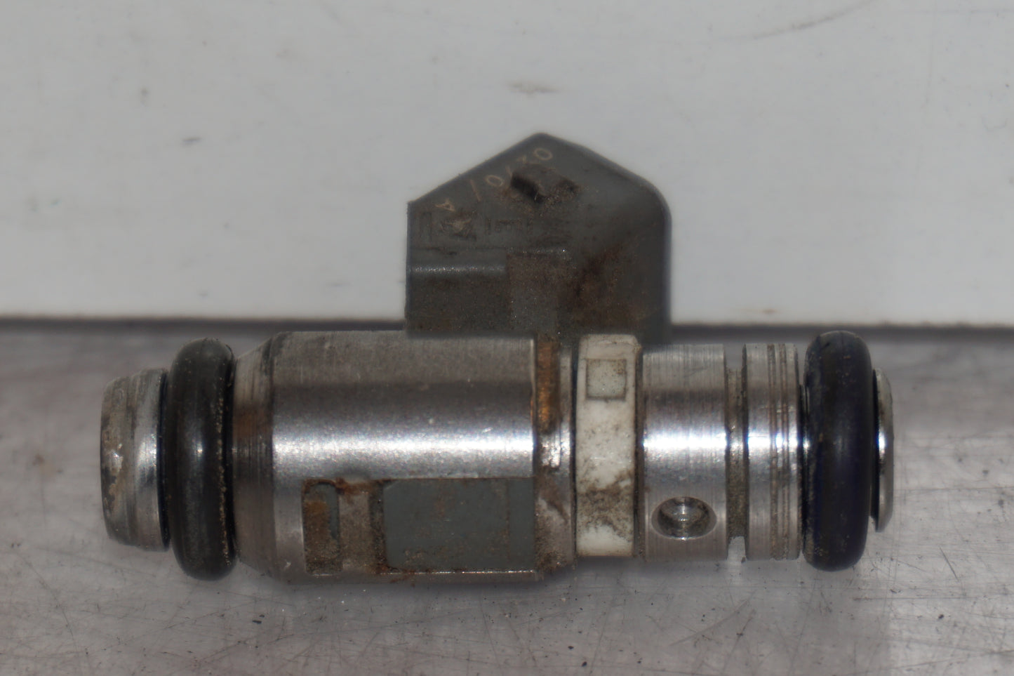 Vänster sida på Spridare från en Aprilia RSV 1000 -2010 motorcykel.