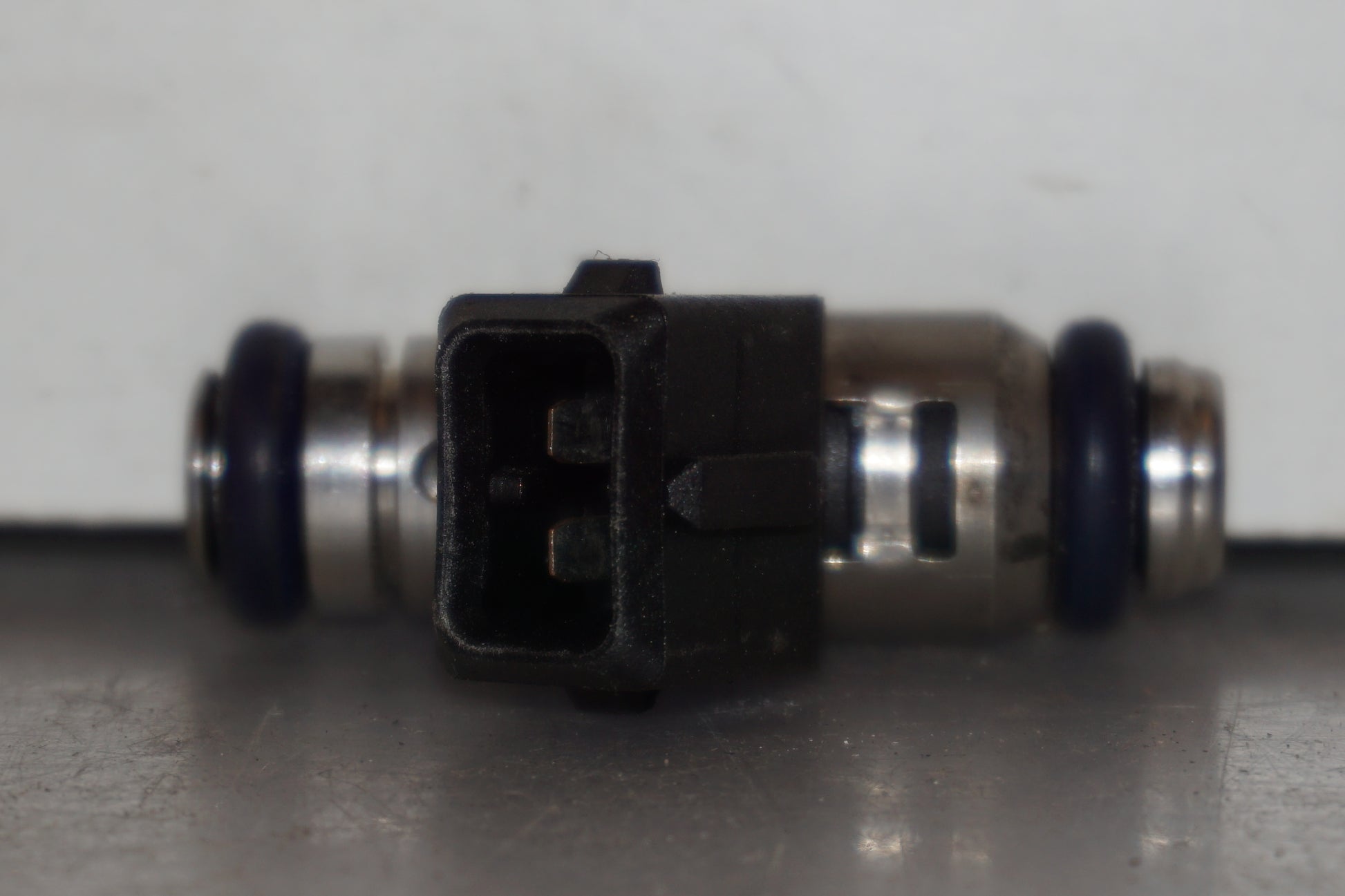 Baksidan på Spridare från en Aprilia RSV 1000 -2010 motorcykel.