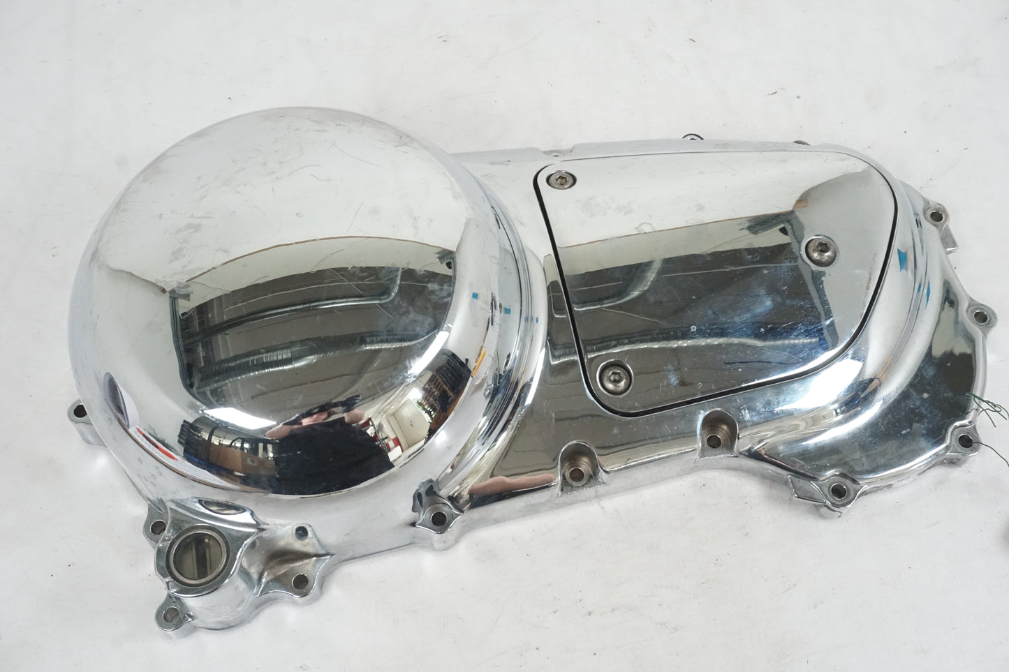 Framsidan på Transmissionskåpa från en Kawasaki VN 1600 Mean Streak -2004 motorcykel.