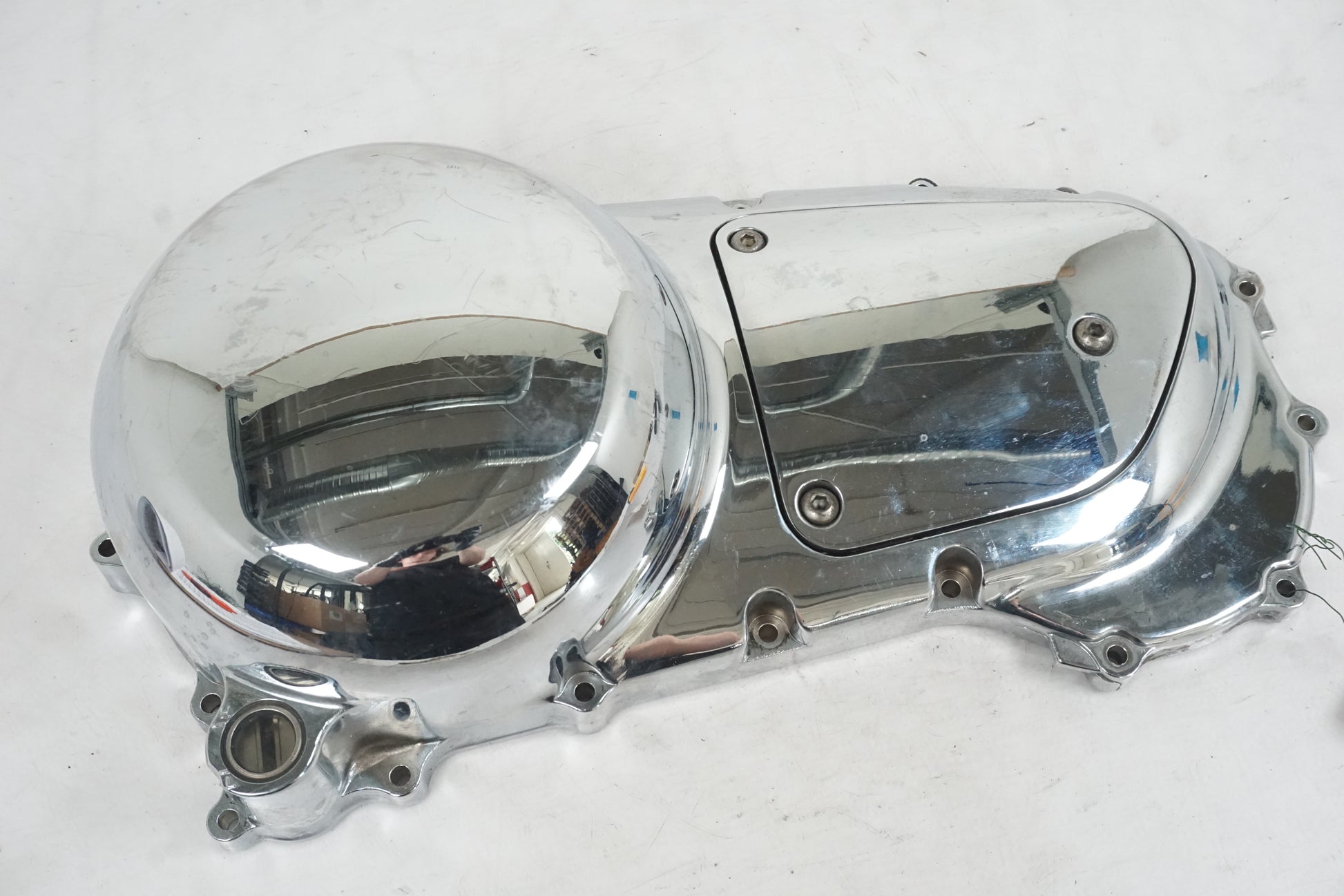 Framsidan på Transmissionskåpa från en Kawasaki VN 1600 Mean Streak -2004 motorcykel.