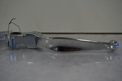 Vänster sida på <p>Bromshandtag höger.</p>

<p>Krom.</p> motorcykel.