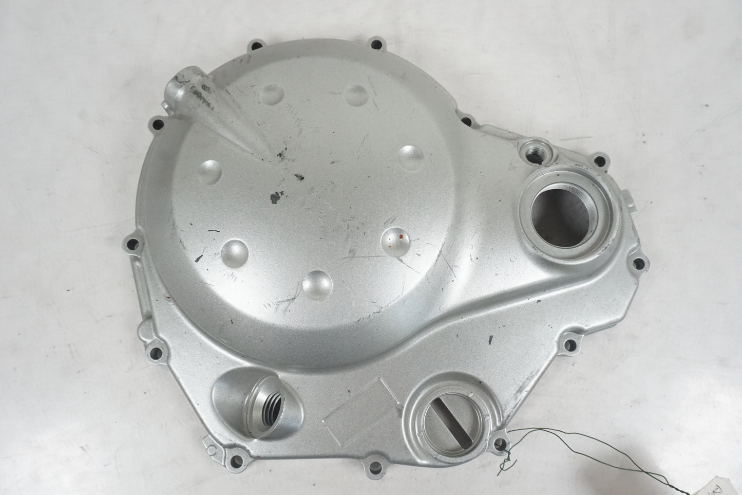 Framsidan på Kopplingskåpa från en Kawasaki ER-6N -2006 motorcykel.