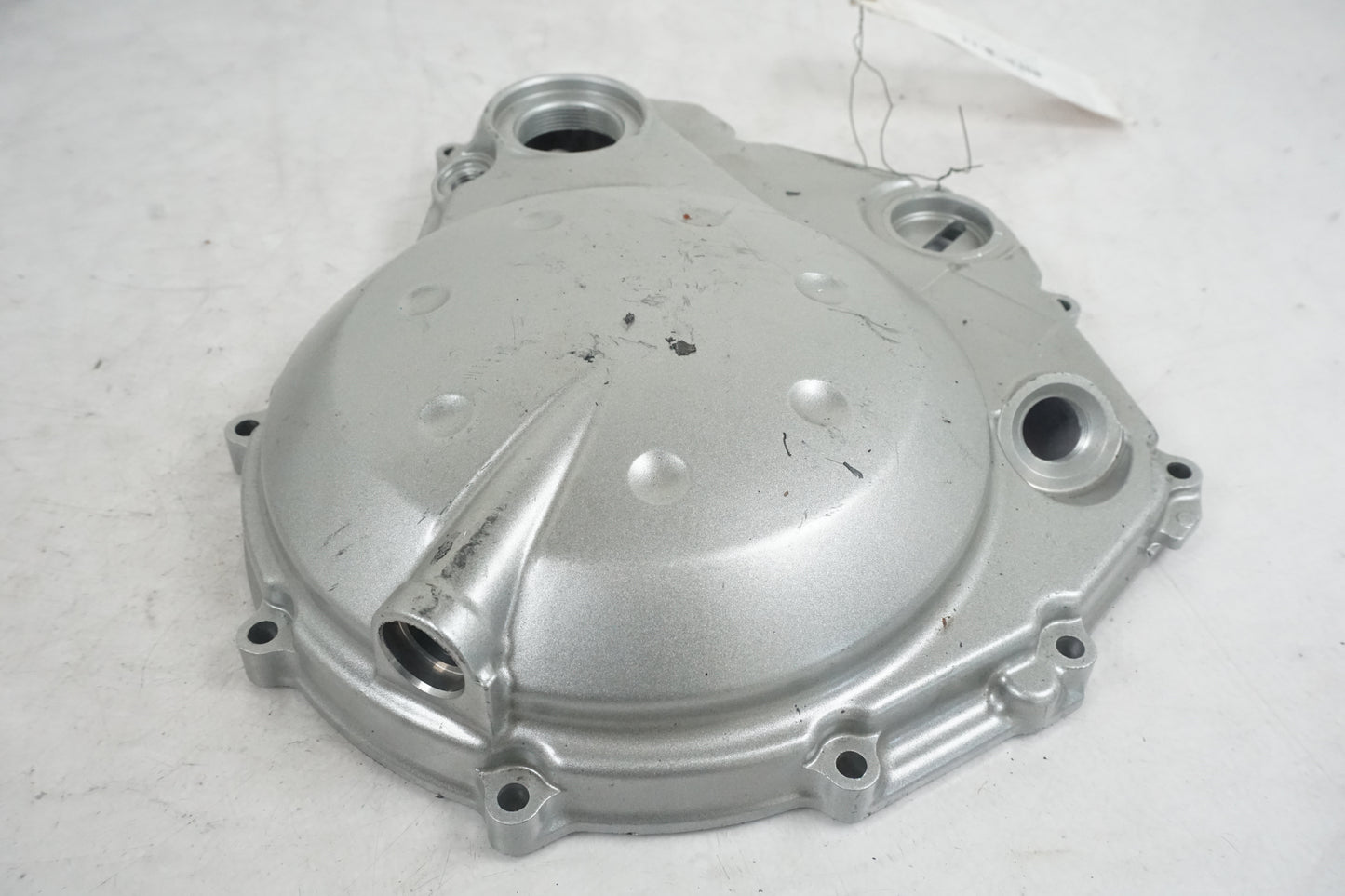 Vänster sida på Kopplingskåpa från en Kawasaki ER-6N -2006 motorcykel.