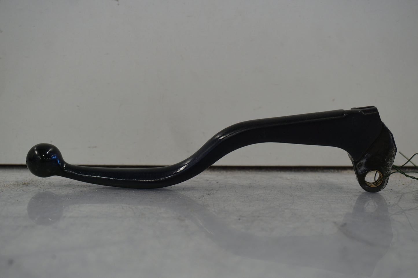 Framsidan på Kopplingsgrepp från en Buell X1 Lightning -2002 motorcykel.