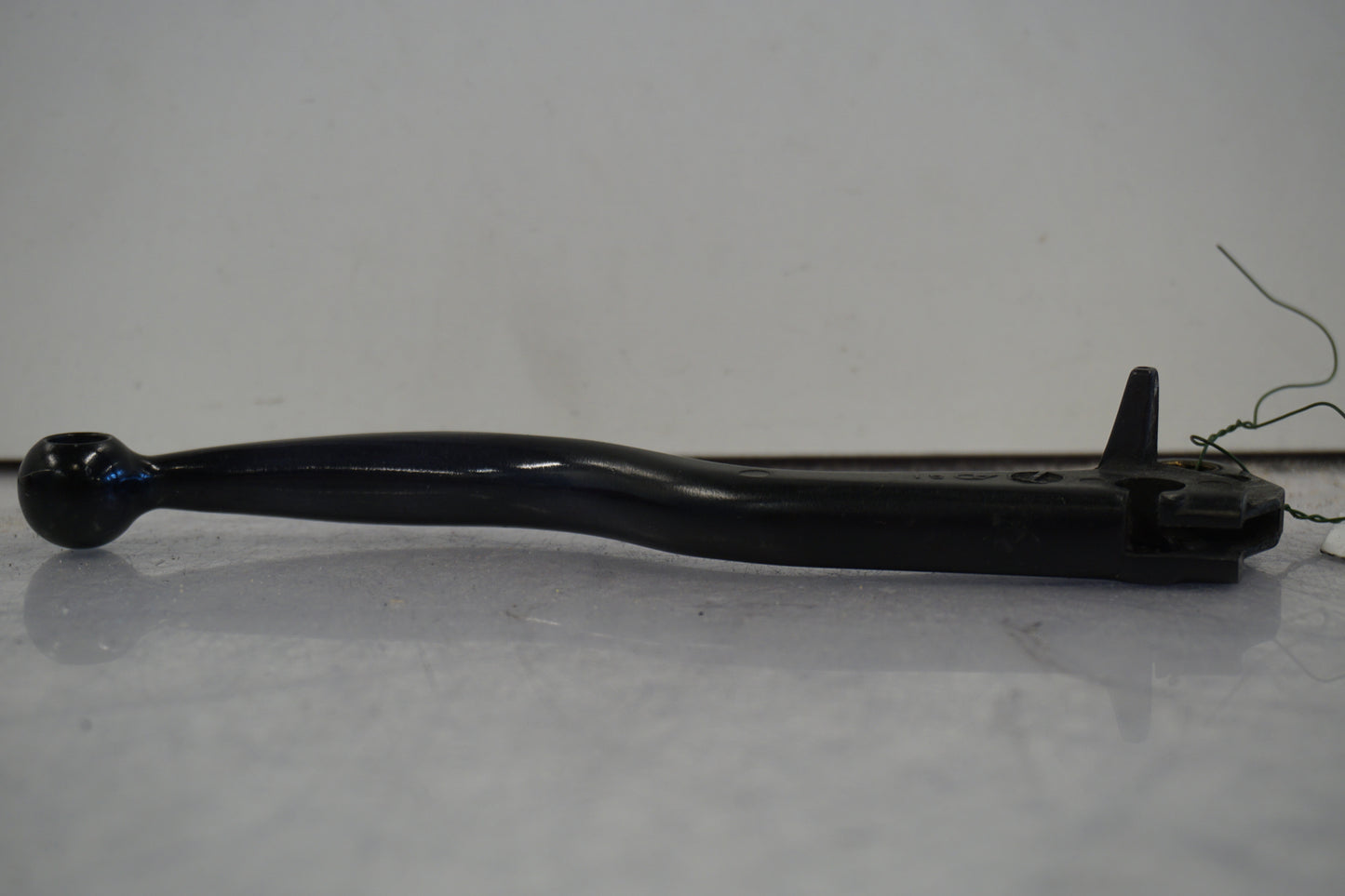 Baksidan på Kopplingsgrepp från en Buell X1 Lightning -2002 motorcykel.