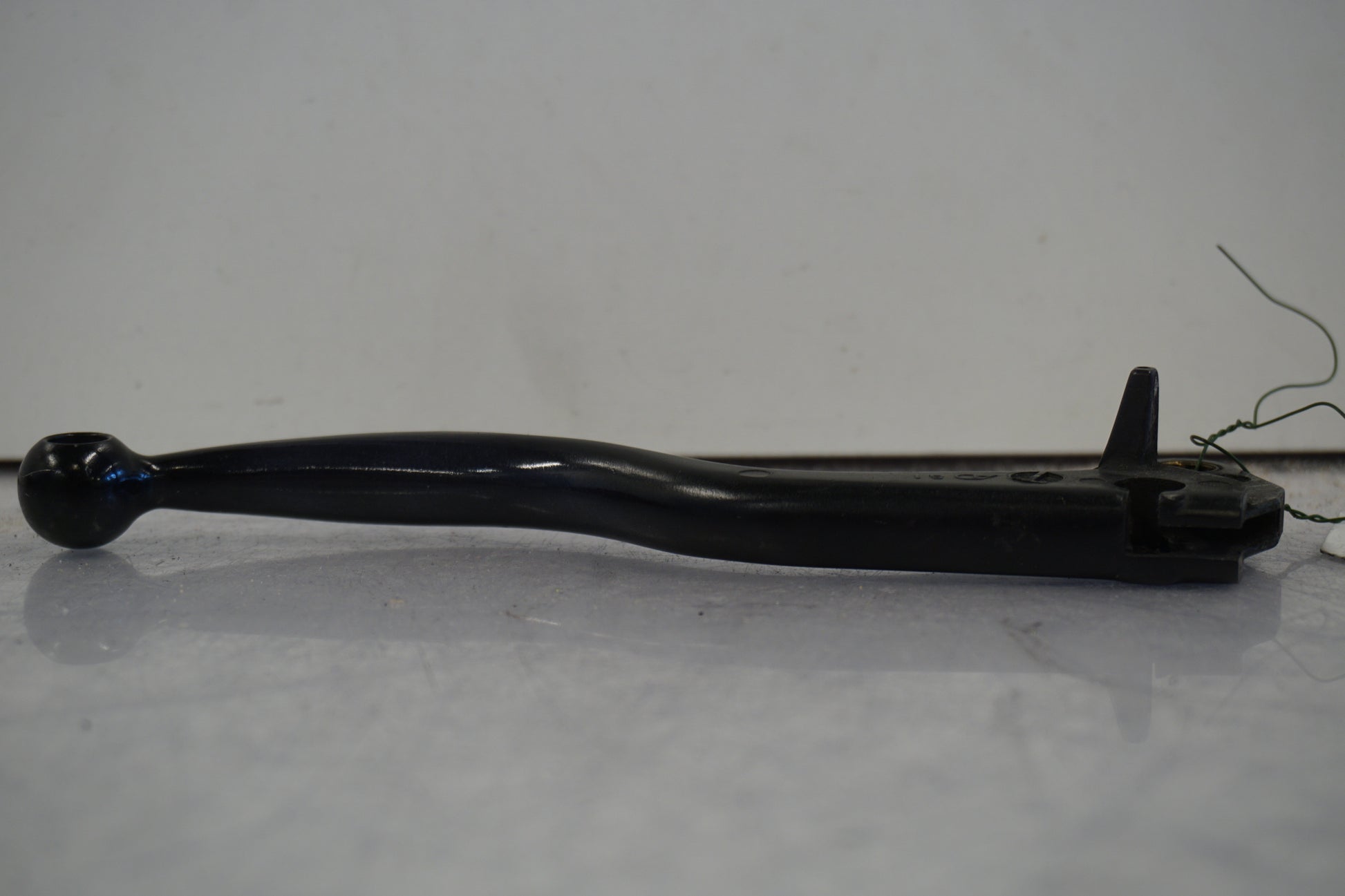 Baksidan på Kopplingsgrepp från en Buell X1 Lightning -2002 motorcykel.