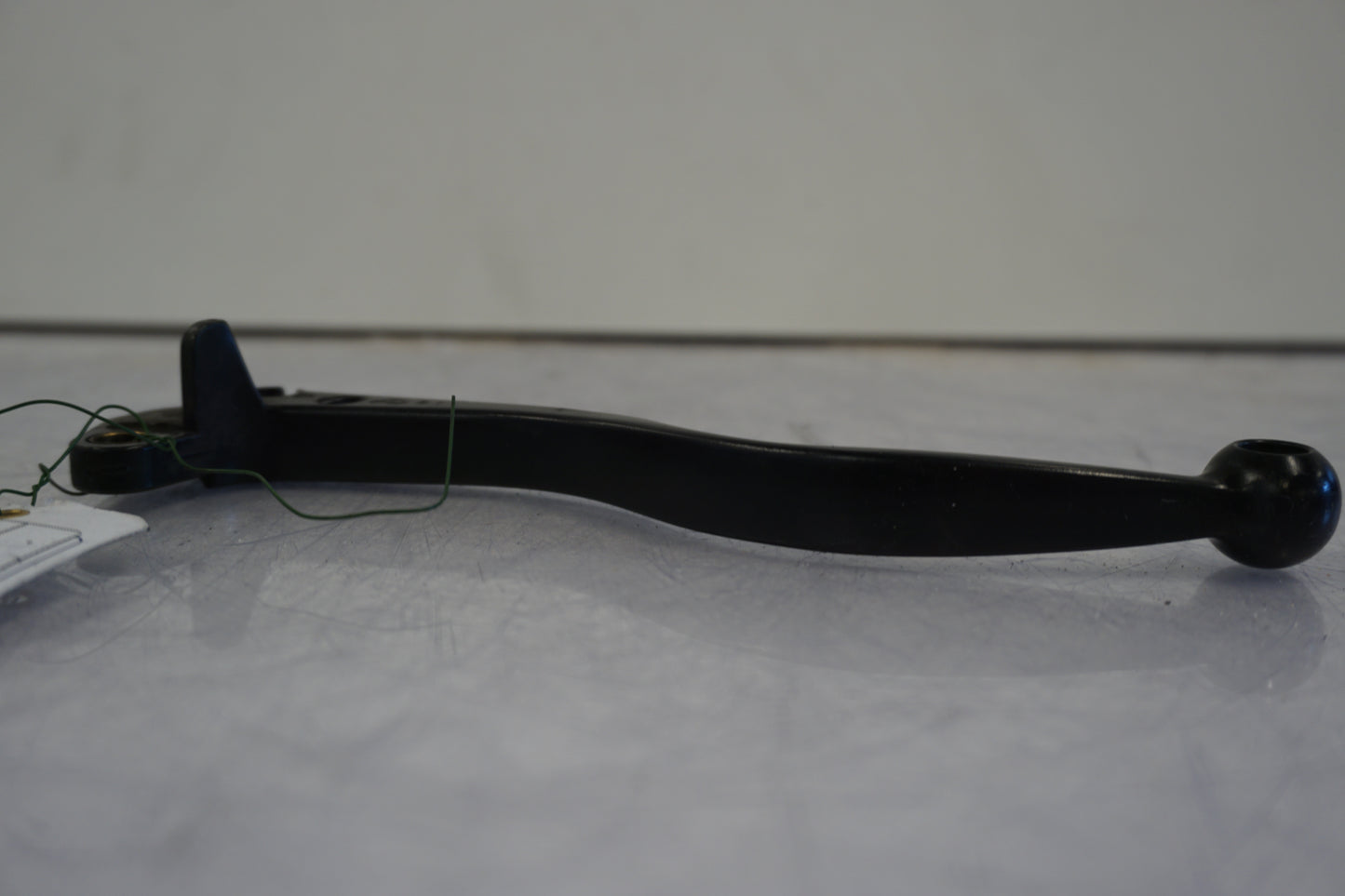 Vänster sida på Kopplingsgrepp från en Buell X1 Lightning -2002 motorcykel.