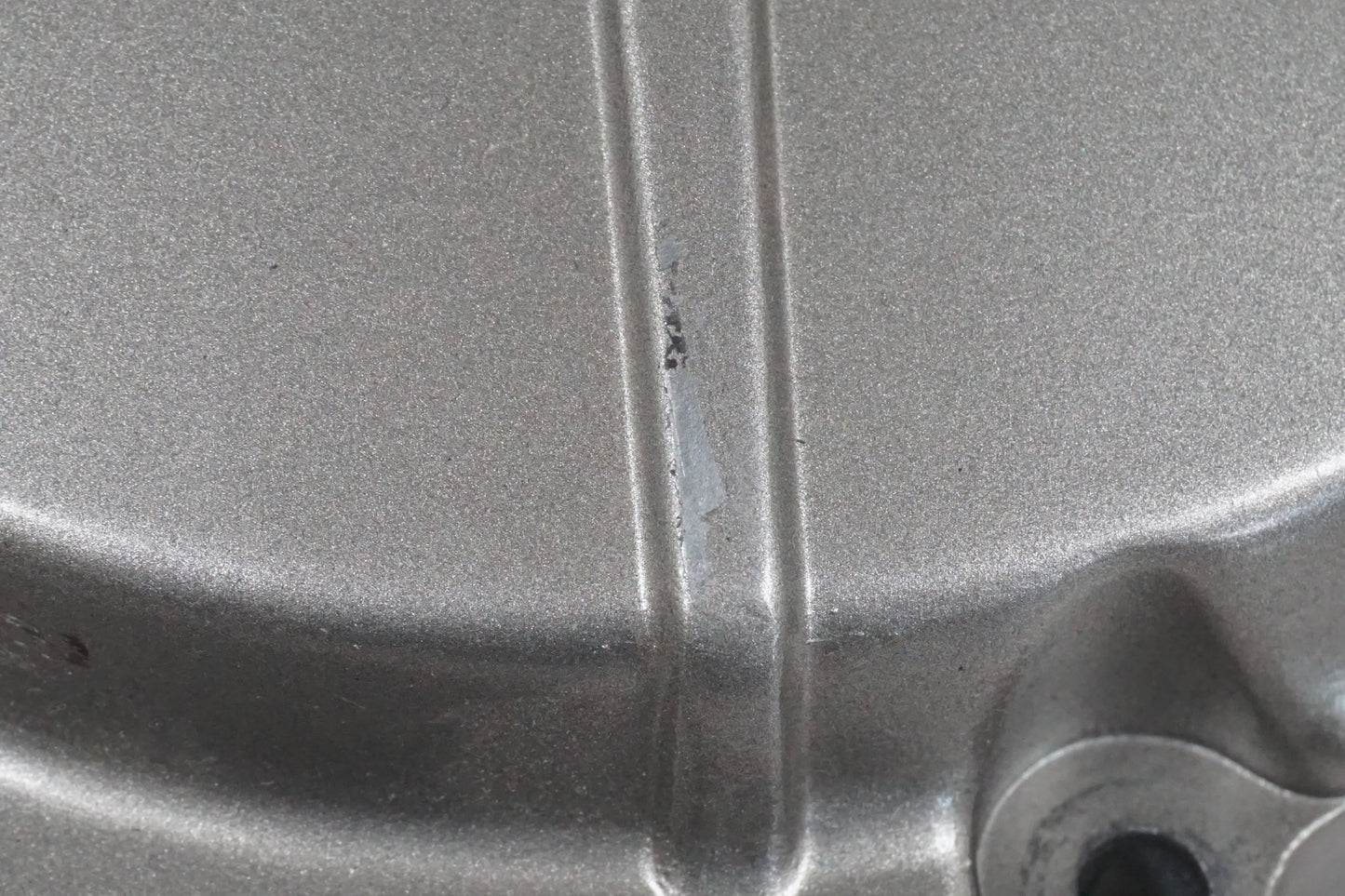 Extrabild1 på Kopplingskåpa från en Honda CB 600 Hornet -1998 motorcykel.