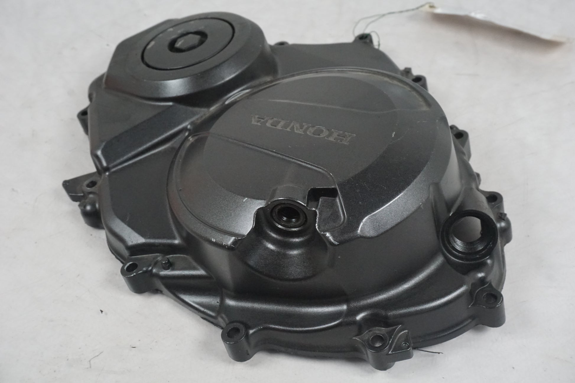 Vänster sida på Kopplingskåpa från en Honda CB 600 Hornet -2011 motorcykel.