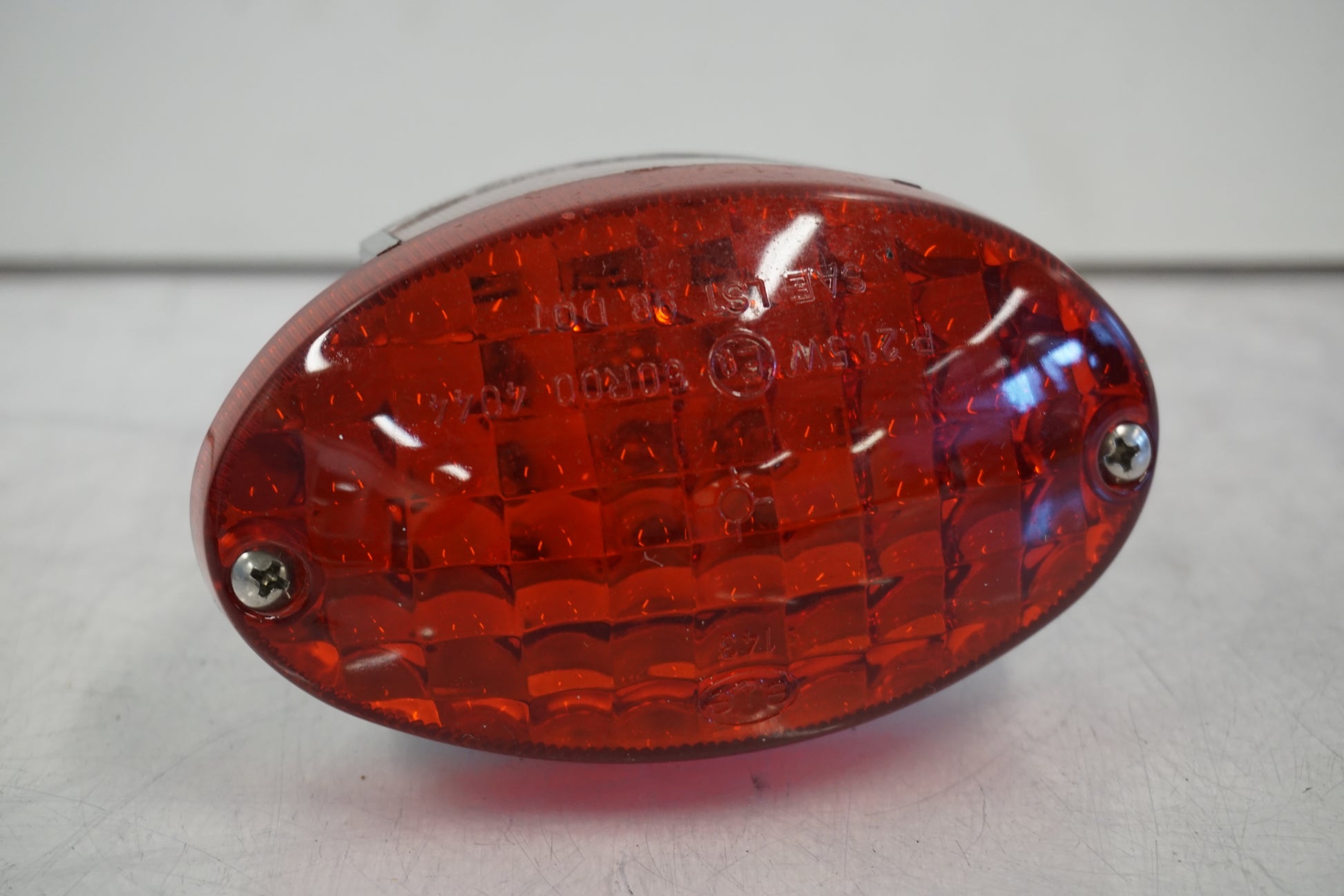 Framsidan på Baklampa från en Buell 1125 CR -2009 motorcykel.