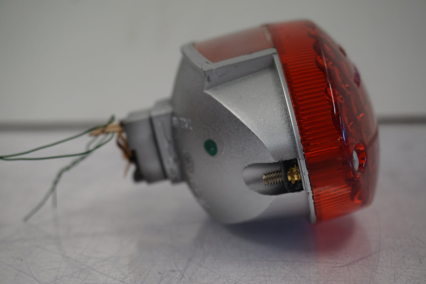 Vänster sida på Baklampa från en Buell 1125 CR -2009 motorcykel.