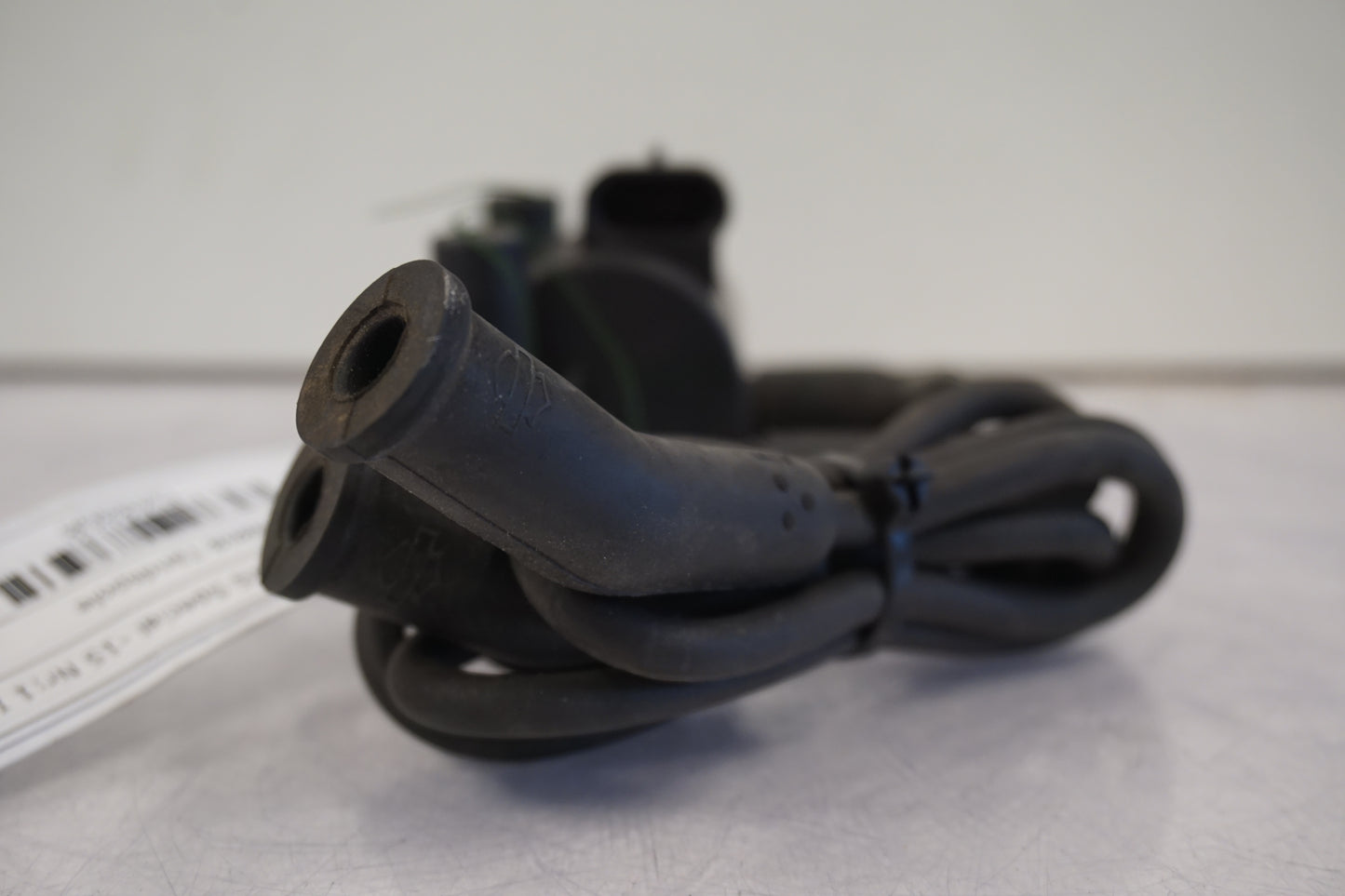 Baksidan på Tändspole från en H-D Street Glide FLHX -2015 motorcykel.