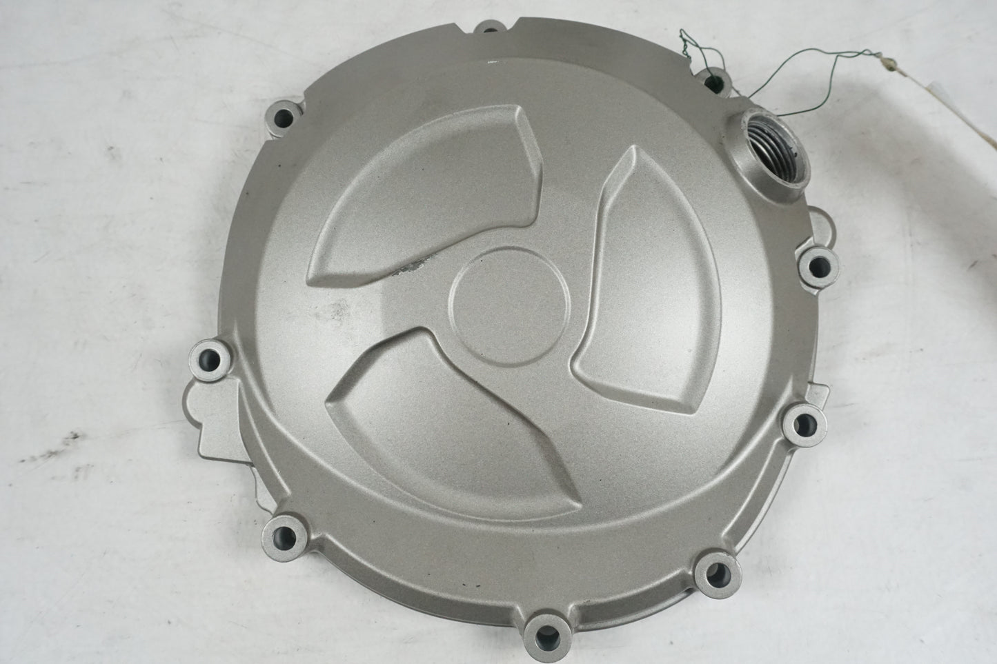 Framsidan på Kopplingskåpa från en BMW S 1000 RR -2012 motorcykel.