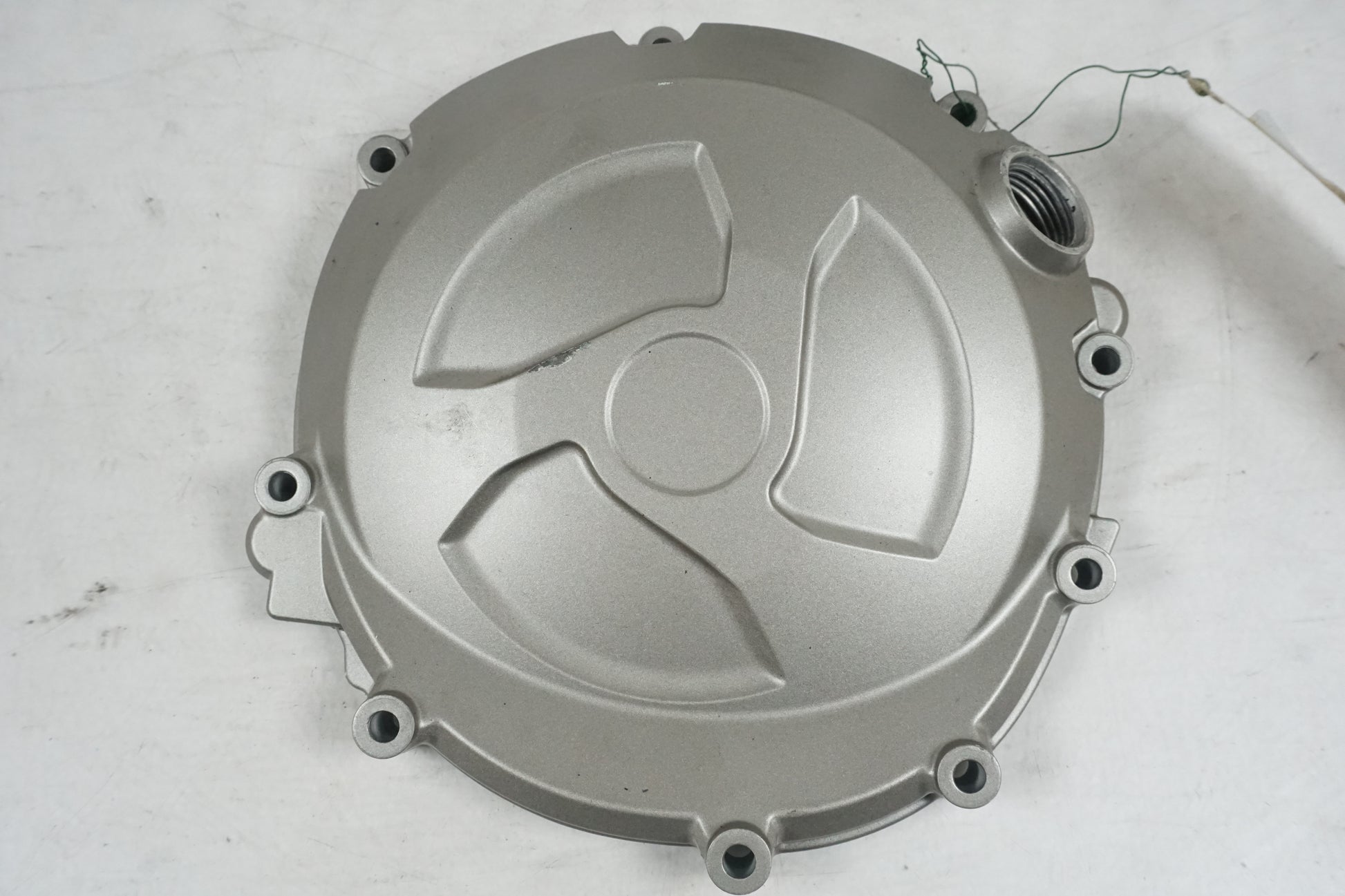 Framsidan på Kopplingskåpa från en BMW S 1000 RR -2012 motorcykel.