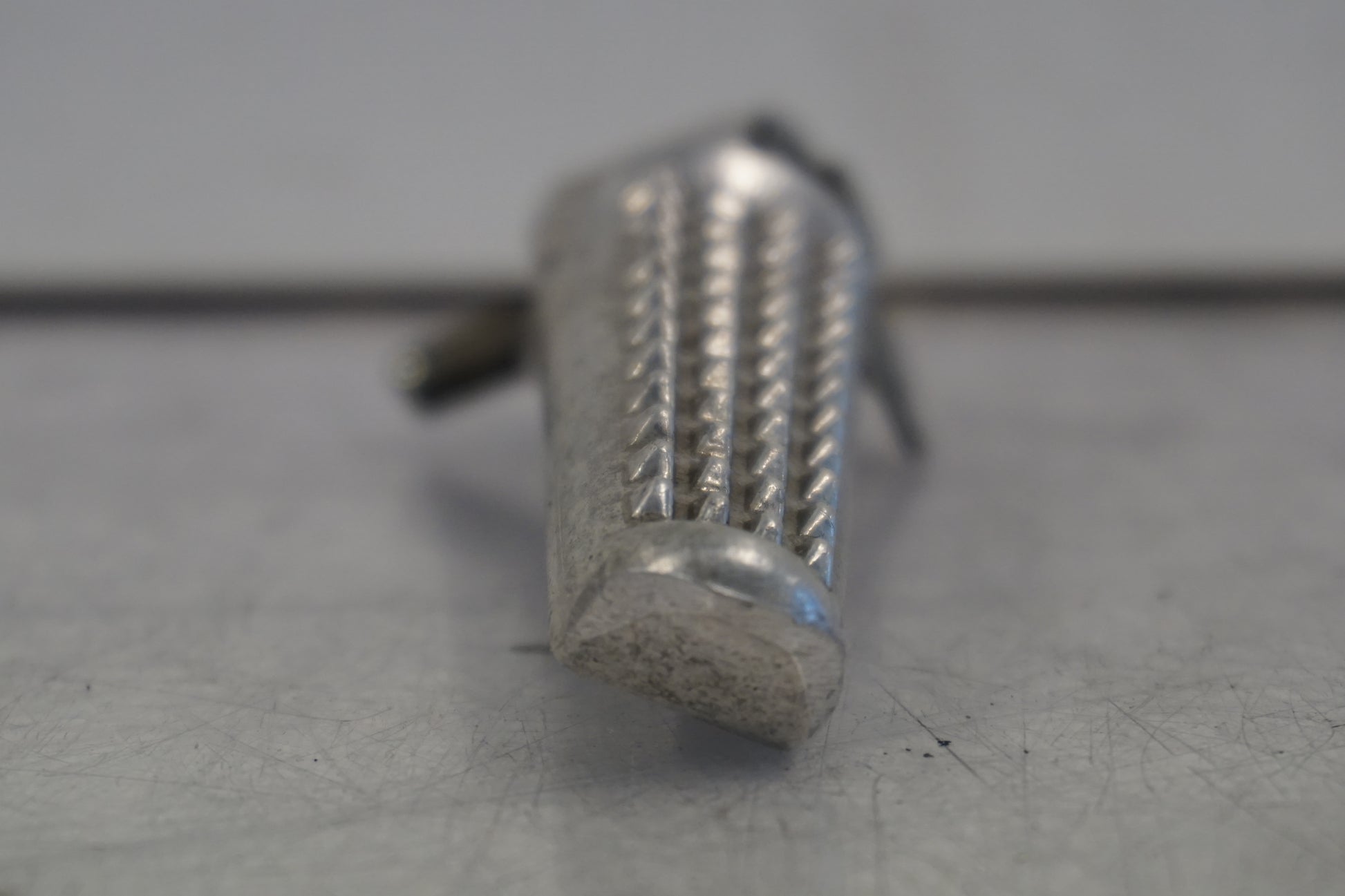 Vänster sida på Fotpinne från en Honda CBR 600 -1993 motorcykel.