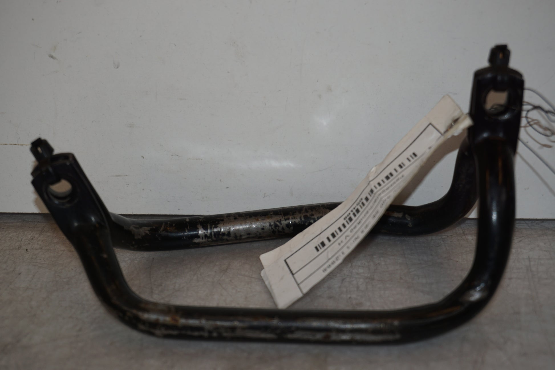 Vänster sida på Passagerarhandtag från en Yamaha XV 400 -1983 motorcykel.