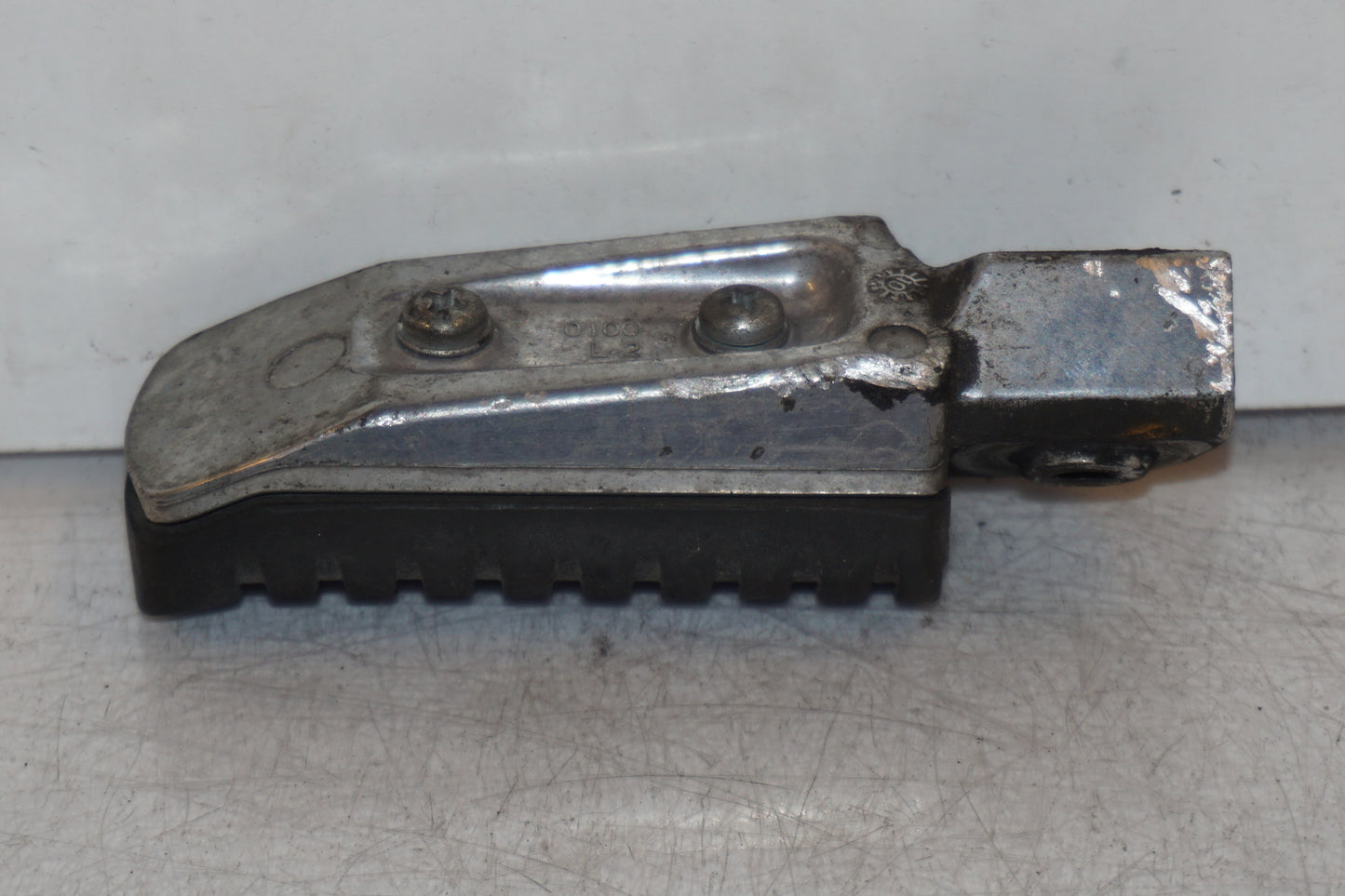 Höger sida på Fotpinne från en Kawasaki ER-6N -2011 motorcykel.