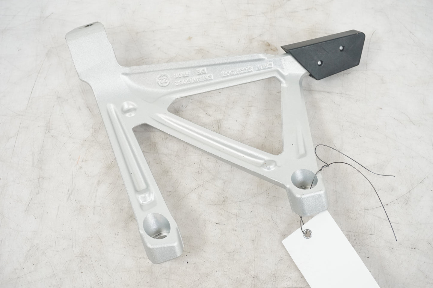 Uchwyt na nóżki fotograficzne