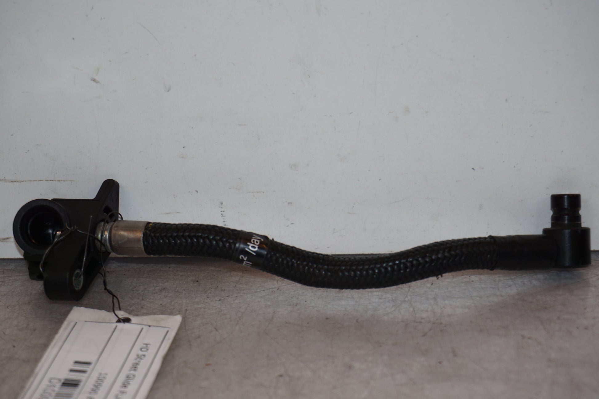 Framsidan på Fuel Rail från en H-D Street Glide FLHX -2009 motorcykel.