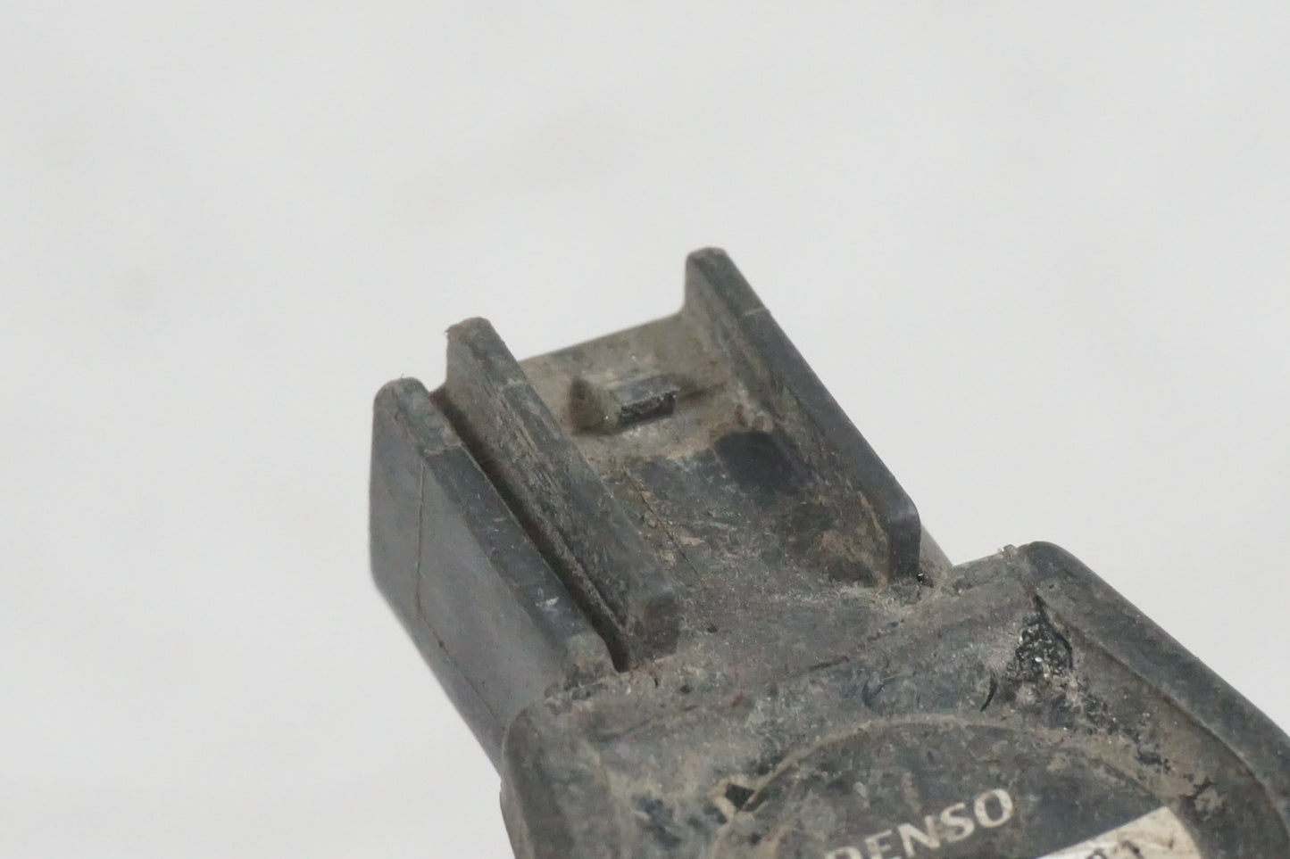 Vänster sida på Tändspole från en Honda CBR 600 -2002 motorcykel.