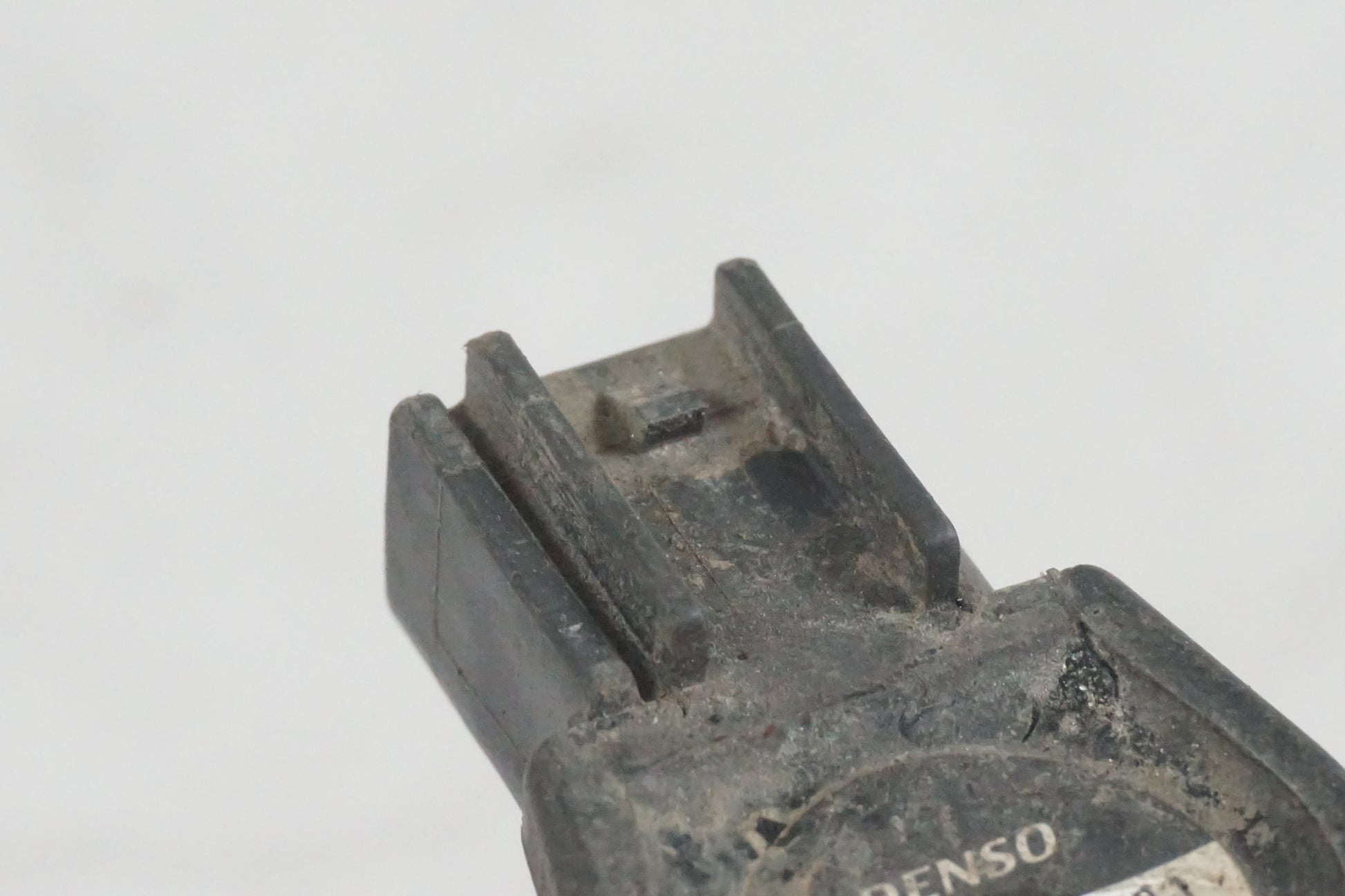 Vänster sida på Tändspole från en Honda CBR 600 -2002 motorcykel.