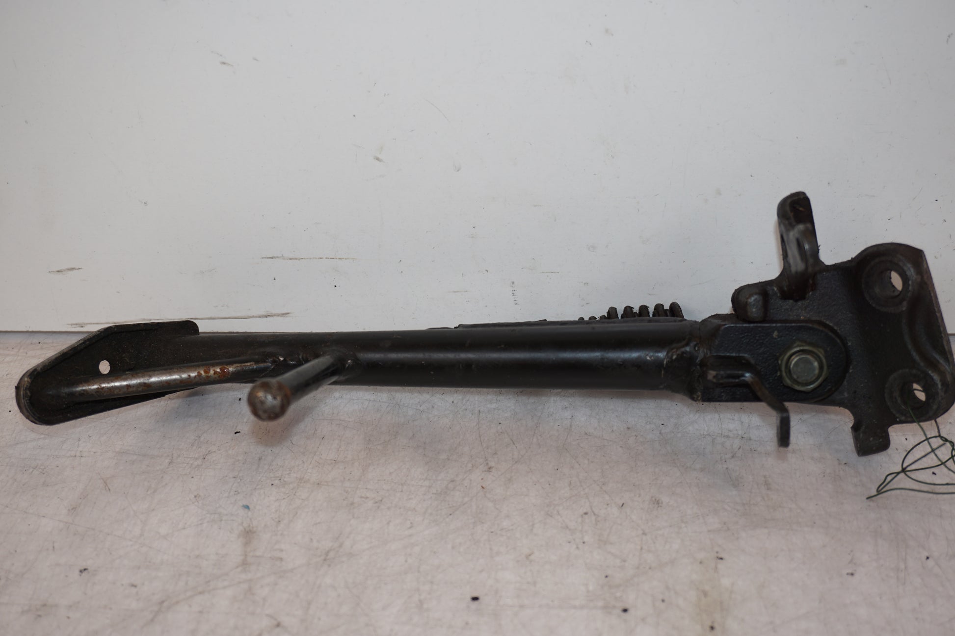 Framsidan på Sidostöd från en Suzuki GSX-R 750 -1997 motorcykel.