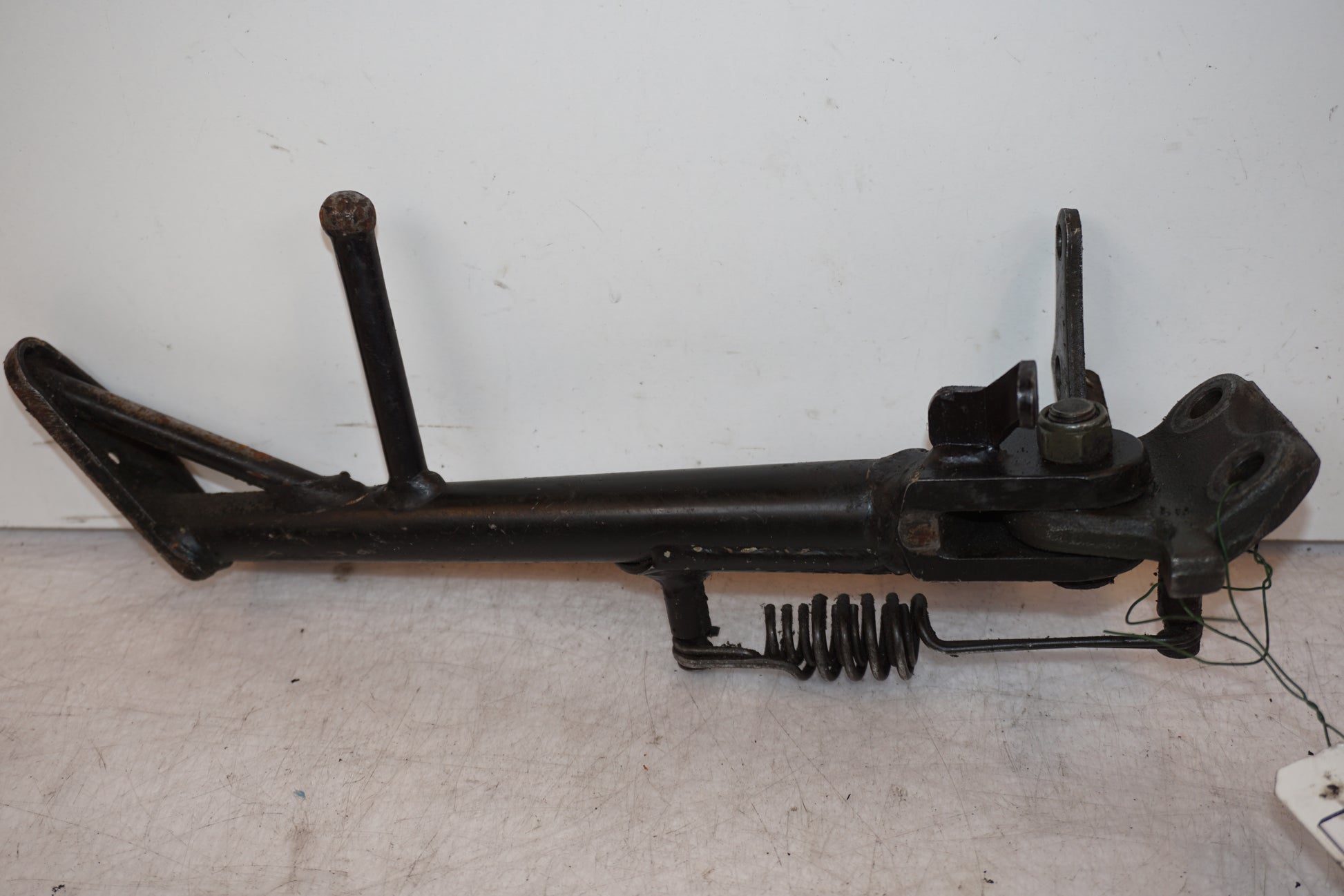 Baksidan på Sidostöd från en Suzuki GSX-R 750 -1997 motorcykel.