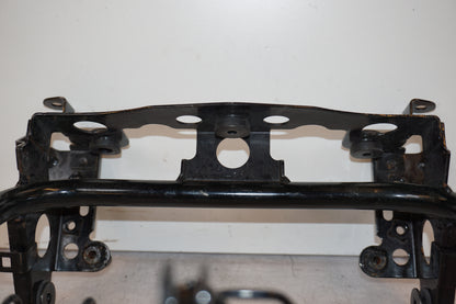 Vänster sida på Strålkastarfäste från en Kawasaki Versys 650 -2007 motorcykel.