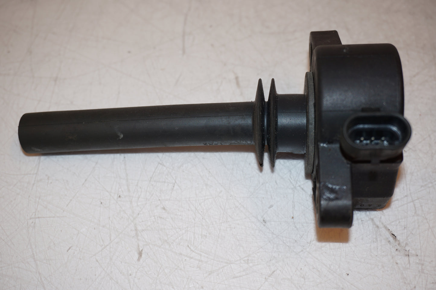 Baksidan på Tändspole från en H-D V-Rod 1130 -2006 motorcykel.